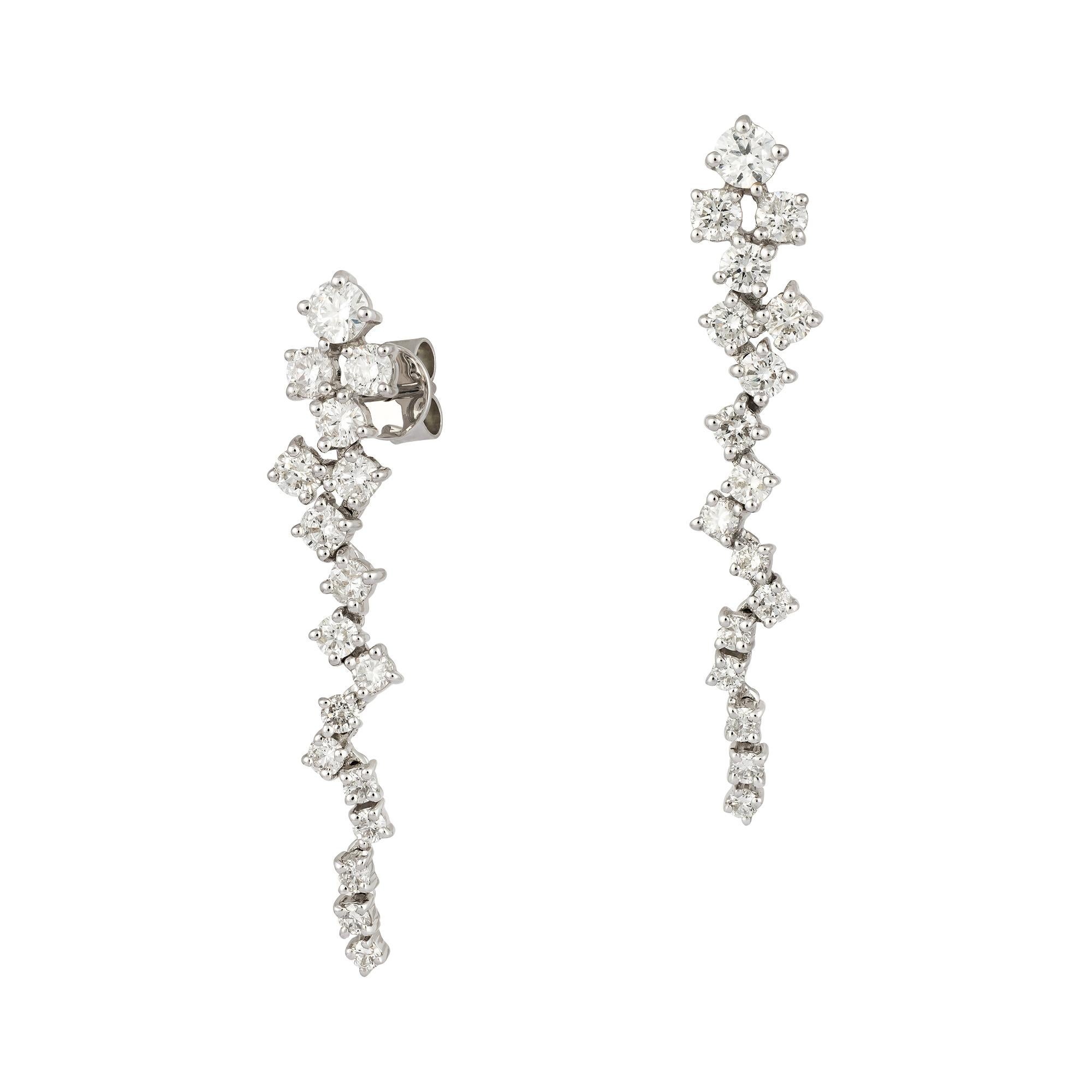 The Following Items we are offering is a Rare Important Spectacular and Brilliant 18KT Gold Large Gorgeous Fancy Cascading Diamond Drop Draping Earrings. Earrings consists of Rare Fine Magnificent Fancy Glittering Diamonds. T.C.W. over 2CTS!!! These