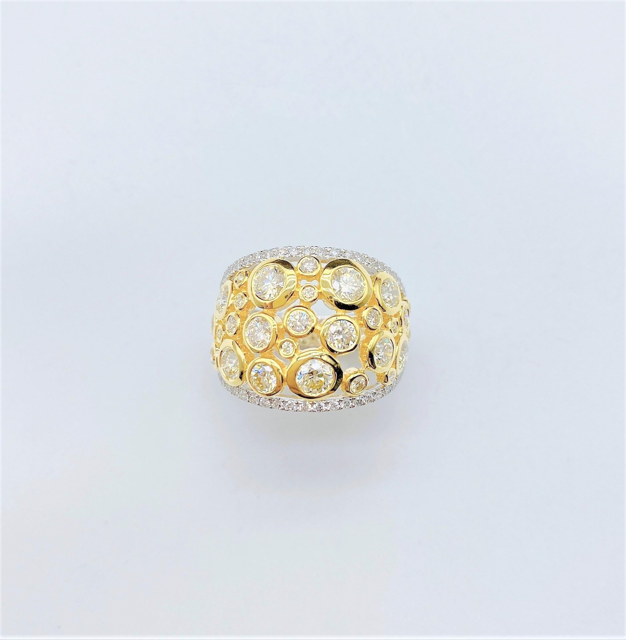The Following Item we are offering is this Rare Important Radiant 18KT Yellow and White Gold Gorgeous and Sparkling Magnificent Fancy Cut Diamond Ring. Ring Contains approx 2CTS of Glittering Diamonds!!! Stones are Very Clean and Extremely