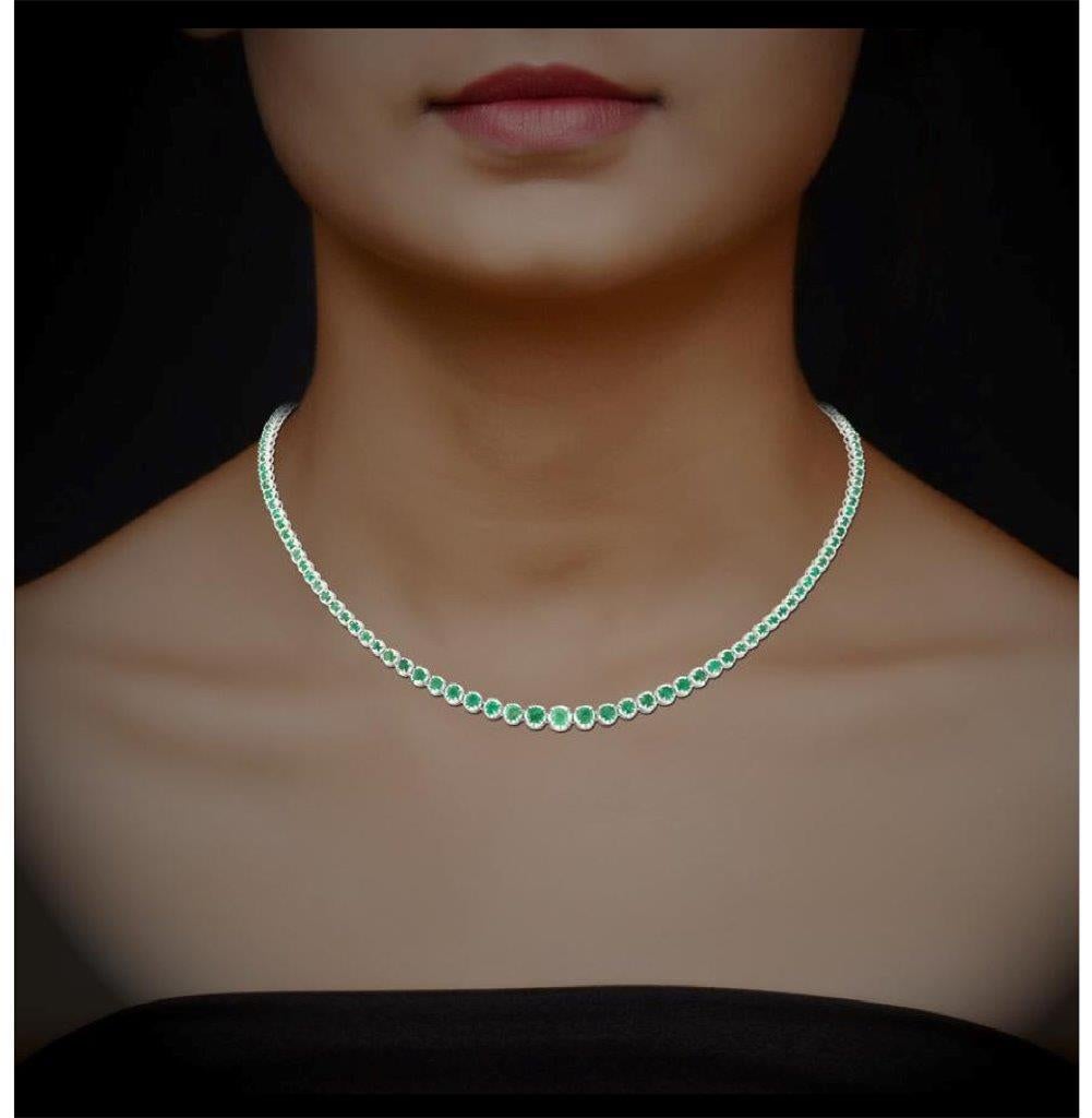 A Rare 18KT White Gold Emerald Riviera Necklace. Necklace is comprised of Finely Set Glittering Gorgeous Emeralds!!! The Emeralds are of Exquisite and Fine Quality. T.C.W. almost 5CTS!!! This Gorgeous Necklace is a Sample Piece and Comes with