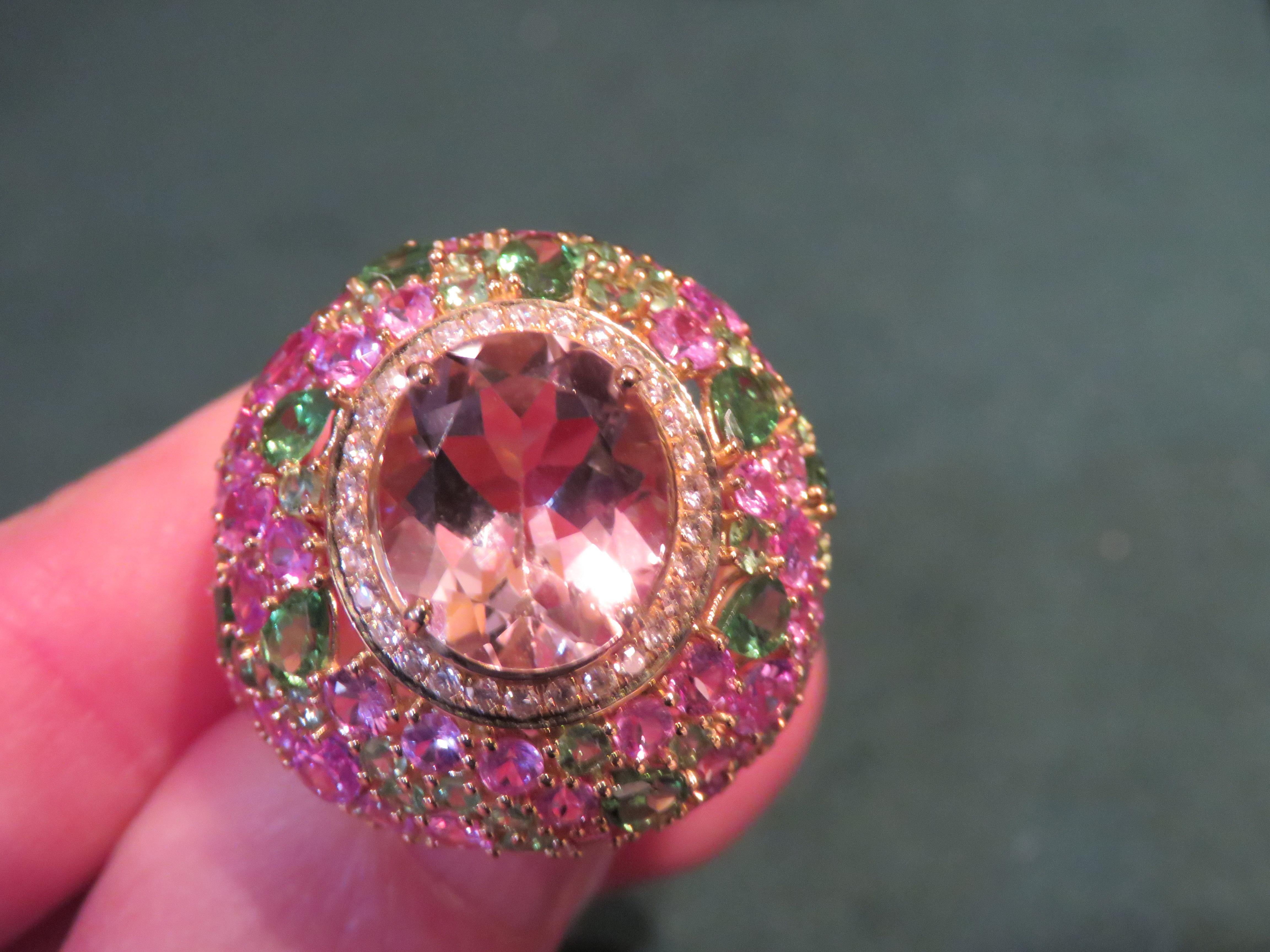 The Following Item we are offering is this Rare Important Radiant 18KT Gold Gorgeous Glittering and Sparkling Magnificent Fancy Cut Morganite Fancy Sapphire and Diamond Ring. Ring Contains a Beautiful Fancy Morganite, surrounded with Diamonds and