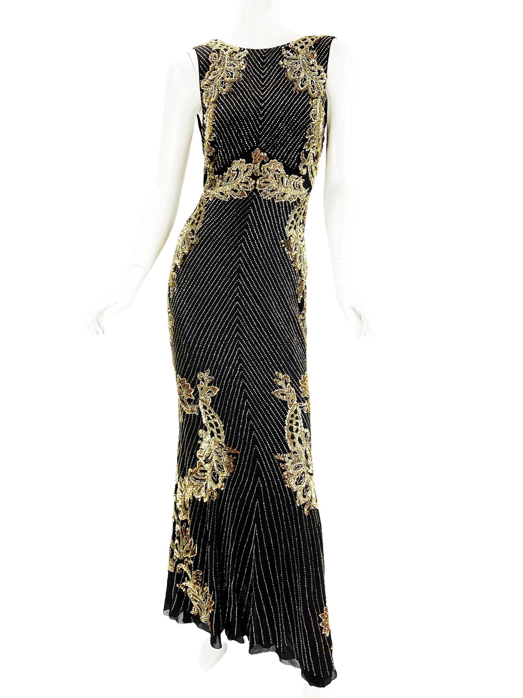New Roberto Cavalli Black Silk Fully Embellished Dress Gown
F/W 2015 Collection
Italian size 42 - US 6
Fully Embellished in Gold and Silver Sequins and Beads, Fully Lined, Back Zip Closure.
Measurements: Length - 57 inches, Bust - 36
