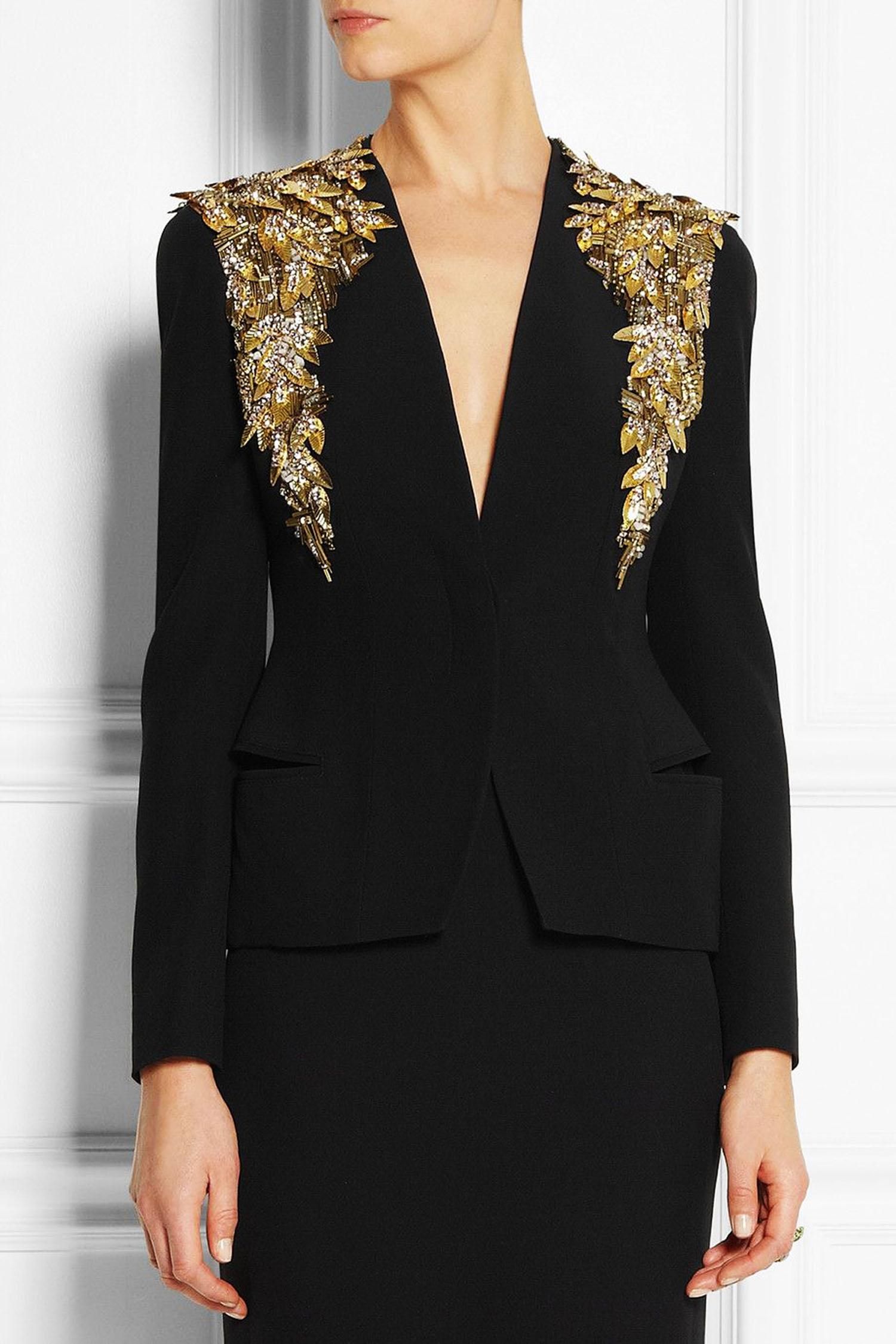 NWT Alexander McQueen Black Crepe Embellished Jacket
S/S 2014 Collection.
Italian size 44
Black mid-weight crepe. Copper sequins. Gold, clear and opaque beads, pink and honey crystals. Gold - tone leaf-shaped sequins. Welt pockets. Fully lined.