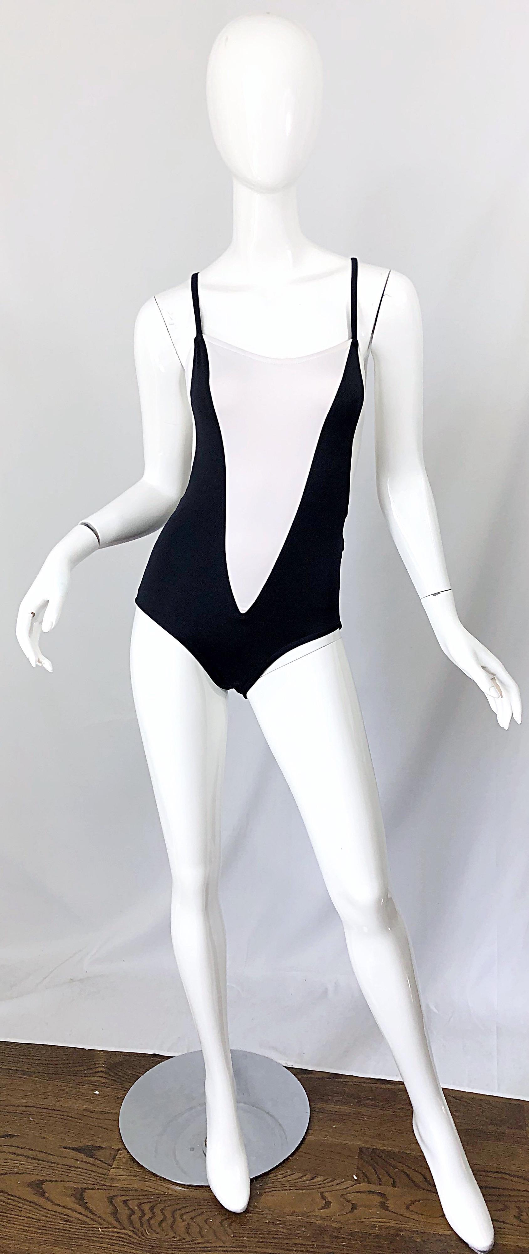Amazing never worn with tags still attached vintage 1980s BILL BLASS trompe l'oeil black and white one piece racerback swimsuit or bodysuit! Looks like a plunging swimsuit with a black and white print. Racerback style offers plenty of support. Great