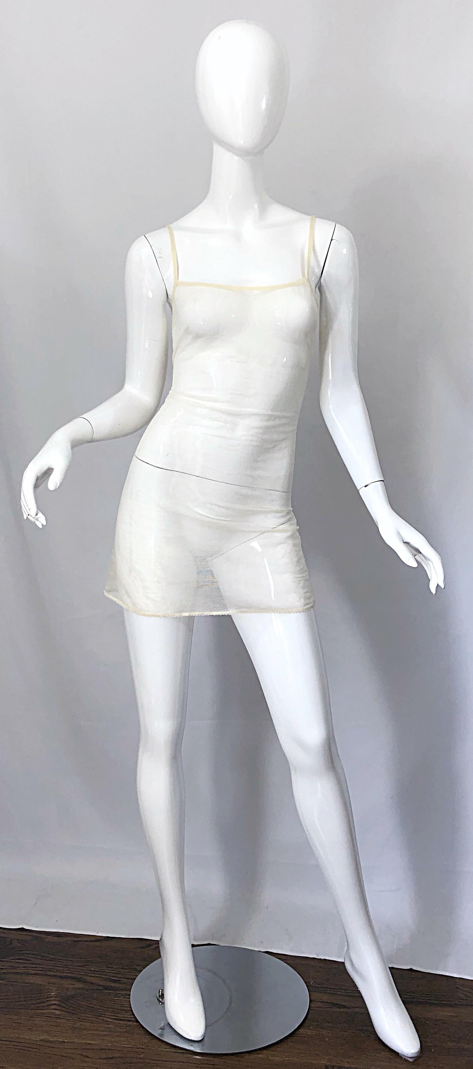 Sexy brand new with tags CHANEL, by KARL LAGERFELD, ivory off - white sheer silk mesh mini slip dress! Simply slips over the head, and stretches to fit. Lace hem and trim / straps. In great unworn condition, with tags and extra fabric still