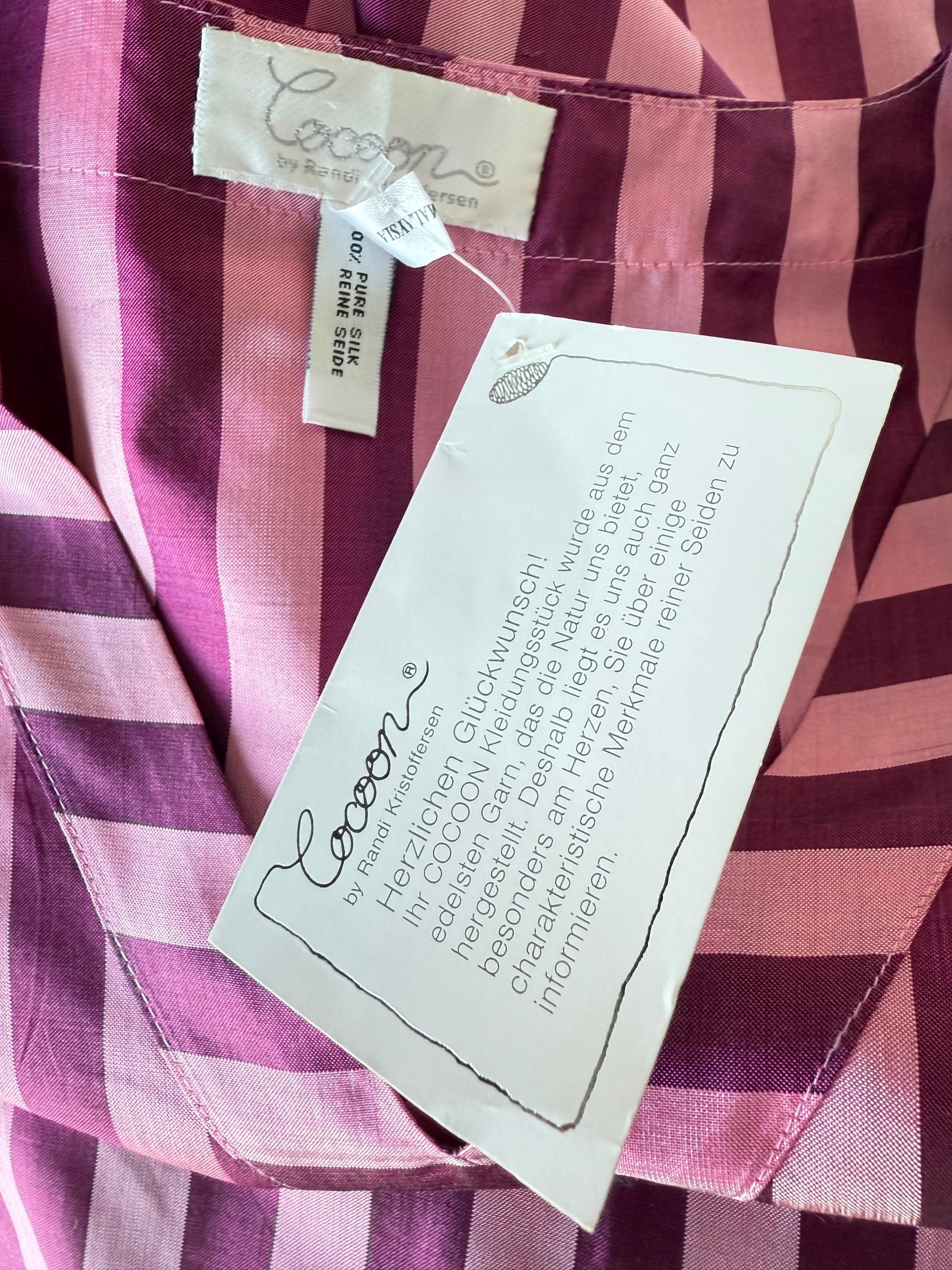 Beautiful brand new with tags Cocoon by Randi Kristoffersen early 2000s Y2K pink striped silk maxi dress / caftan ! Features two shades of pink, with slimming vertical stripes down the front and horizontal stripes on the sides and neck. Simply slips