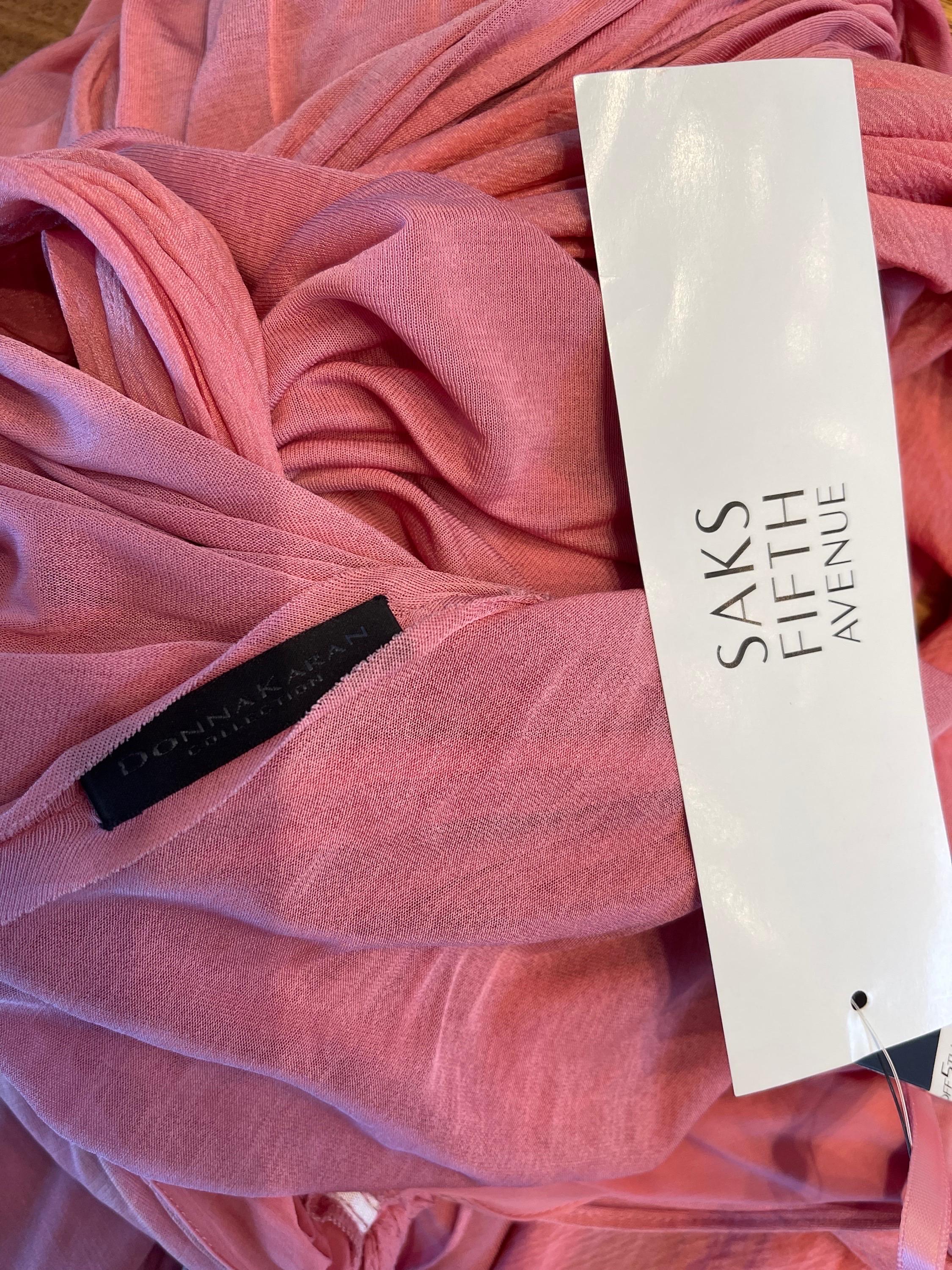 Brand new with original $3,295 Saks 5th Avenue price tag DONNA KARAN Fall 2005 pink / rose 1930s style Grecian gown ! Features braided knots at each shoulder and down the front center. Simply slips over the head and stretches to fit. Soft silk /
