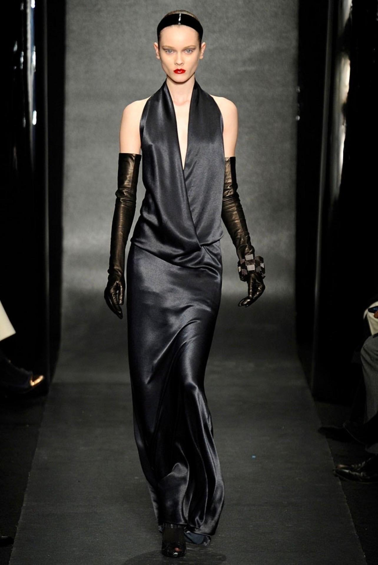Brand new with tags sexy DONNA KARAN Fall 2010 Runway Size 10 anthracite / dark grey silk, rayon and spandex plunging gown ! Simply slips over the head. Drapes the body beautifully and is extremely flattering. Retailed for $3,295 in 2010, which is