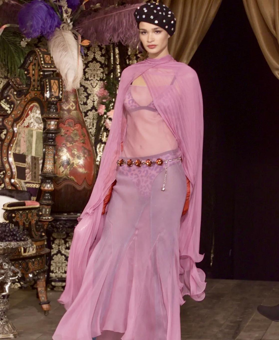 From Dolce & Gabbana’s Fall/Winter 2000 collection, this unworn sheer mesh underwear features a vivid purple rose print over a soft beige base. Cut in a classic low-rise silhouette, similar sheer lingerie pieces debuted on the season's runway