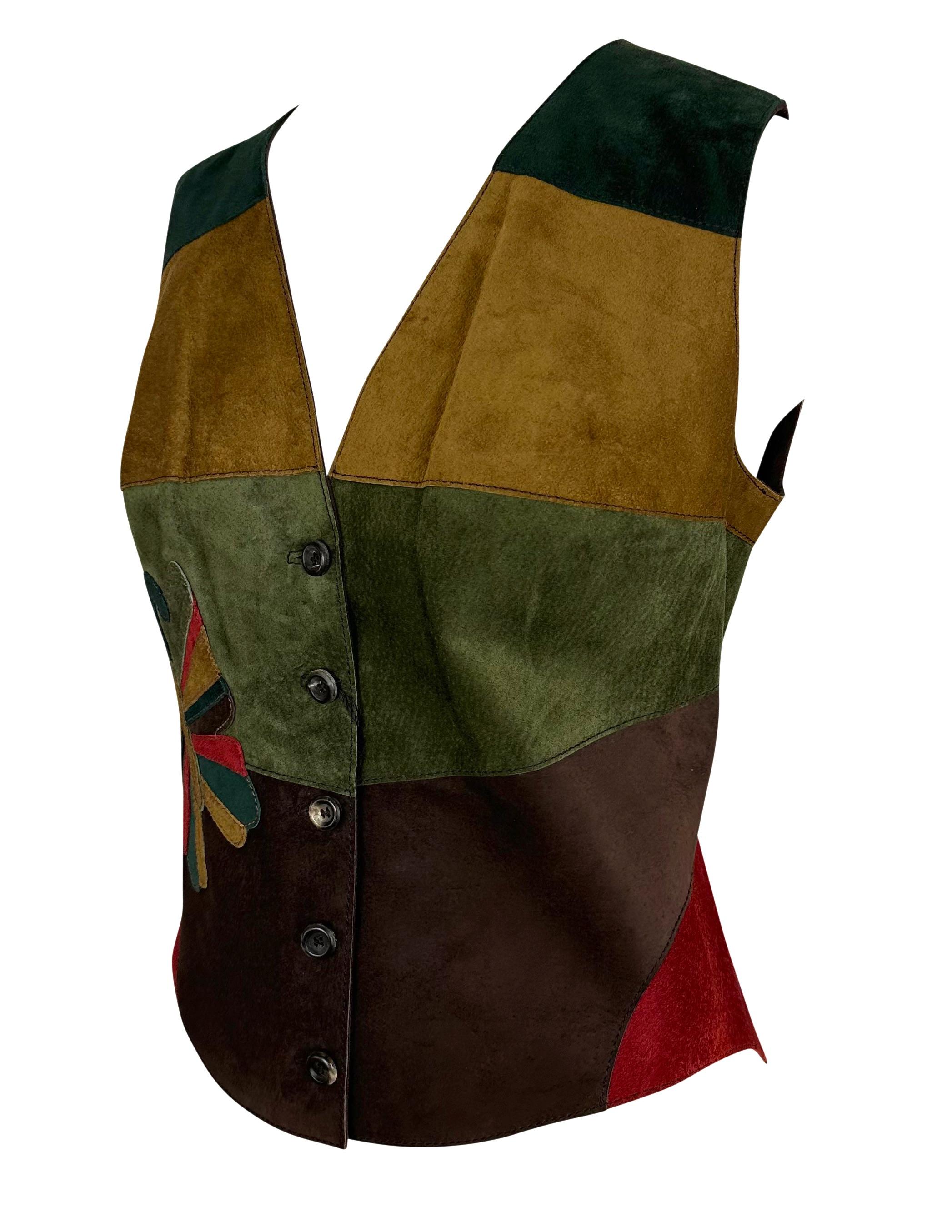 Presenting a fabulous color block  Dolce and Gabbana suede butterfly vest. From the Fall/Winter 2002 collection, this vest features multicolor suede panels sewn together to create a large butterfly on the back, with the design of the wings being