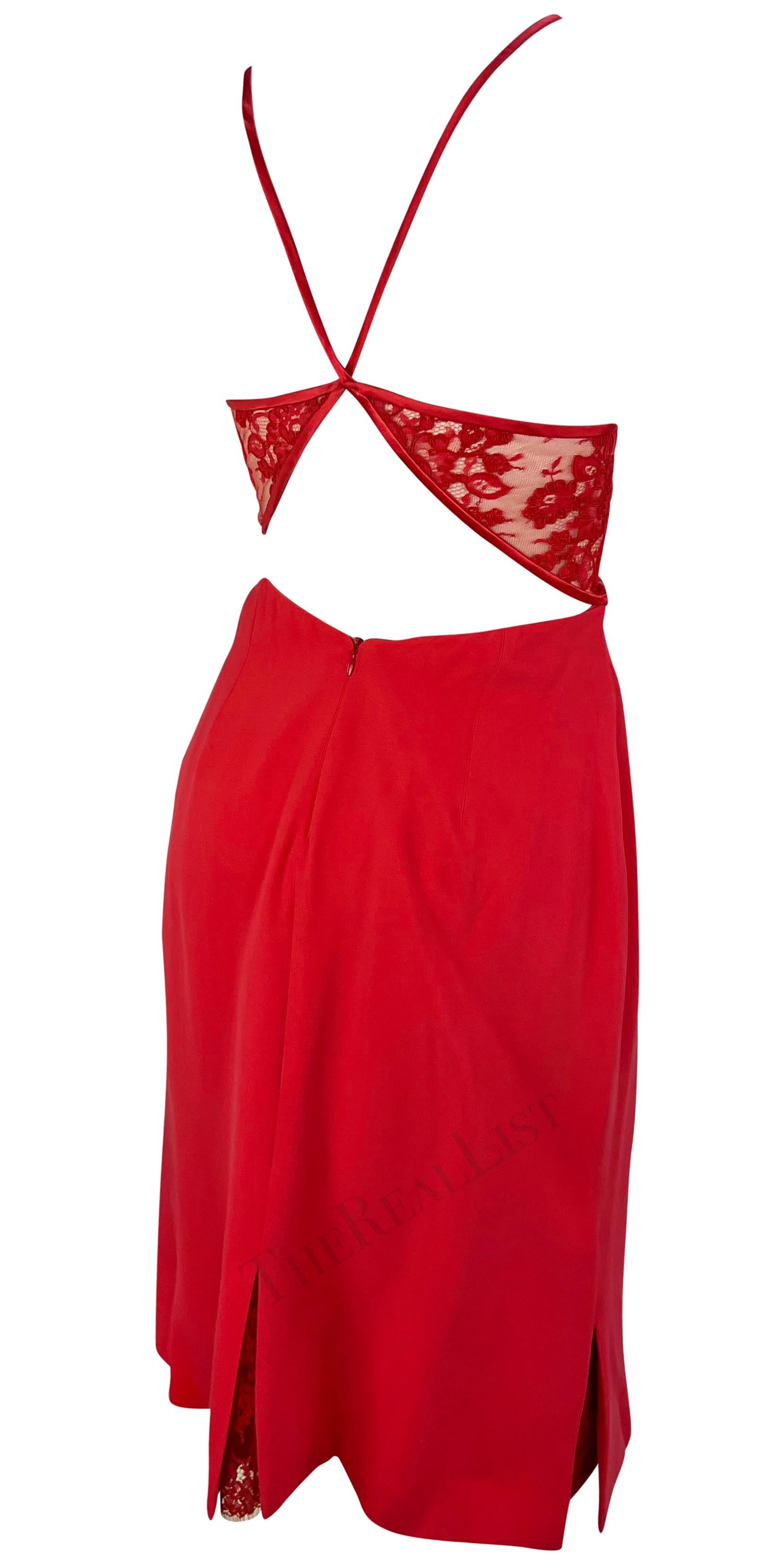 Presenting a stunning bright red Valentino mini dress from the Fall/Winter 2001 collection. This vibrant lingerie-inspired mini dress, in Valentino’s signature color, features a sheer lace bust that extends to an exposed back. The dress features a