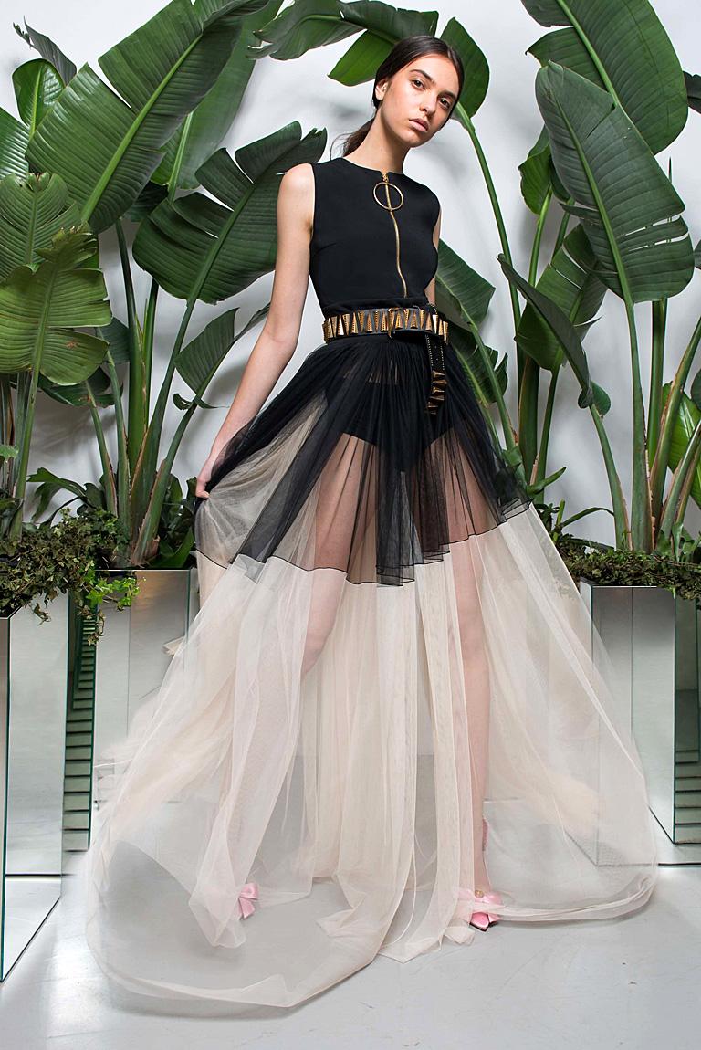 Fabulous black and off white asymmetric runway gown by Fausto Puglisi.  Eye catching presence showcases a fabulous feast for the eyes.   

Fashioned of black crepe and ecru net with separate slip to be worn with or without.  (see photos)  Features