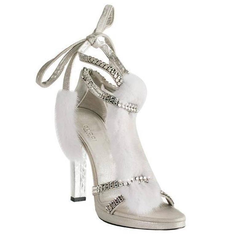 Tom Ford for Gucci Silver-Tone Real Mink Swarovski Crystal Sandals
F/W 2004 Collection
Italian size - 36 B (US - 6 B)
Swarovski Crystal Embellished Wrap Style Ankle Shoes
100% Real Mink, Silver- tone Snakeskin Heel - 4.5 inches
Leather Platform -
