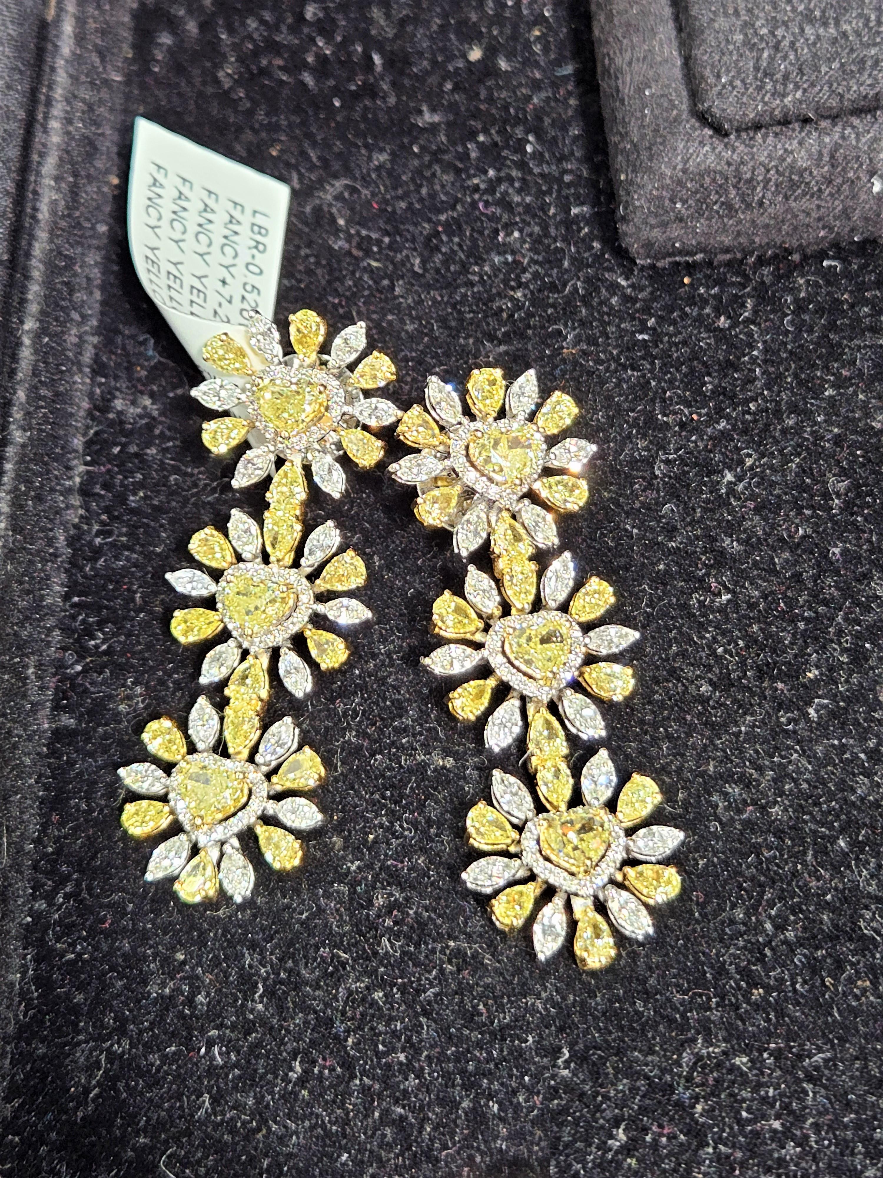 The Following Item we are offering is this Beautiful Rare Important Gold Large Glittering Heart Diamond Dangle Earrings. These Magnificent Earrings are comprised of approx 9CTS Magnificent Rare Gorgeous Fancy Glittering Heart Shaped Yellow Diamonds