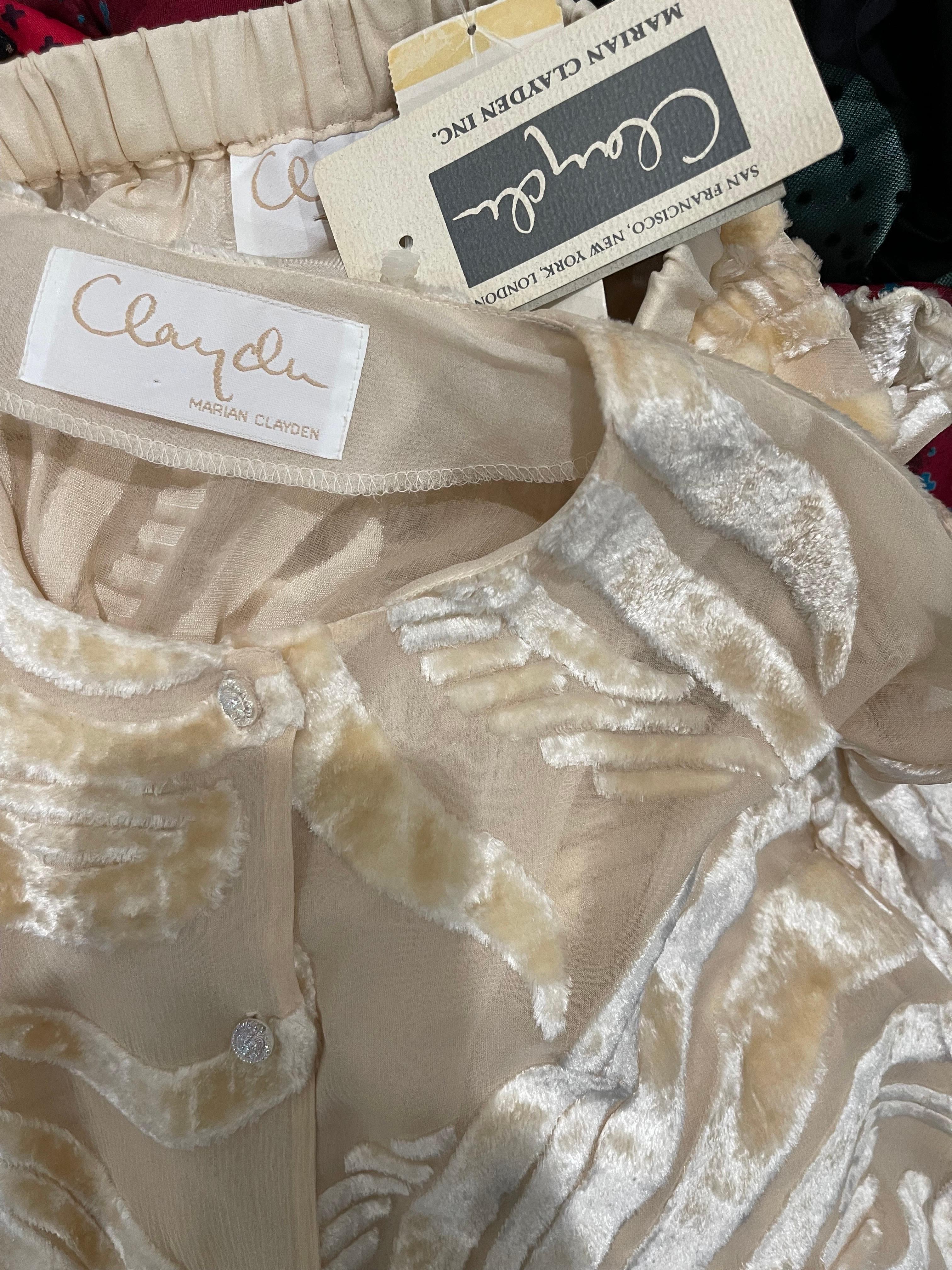 New with tags MARIAN CLAYDEN Fall 2000 ivory silk devore semi sheer blouse and skirt ensemble ! Shirt is unlined, and skirt is lined. Buttons u the front of the blouse. Skirt has an elastic waistband. Gathers at the right hem look amazing when
