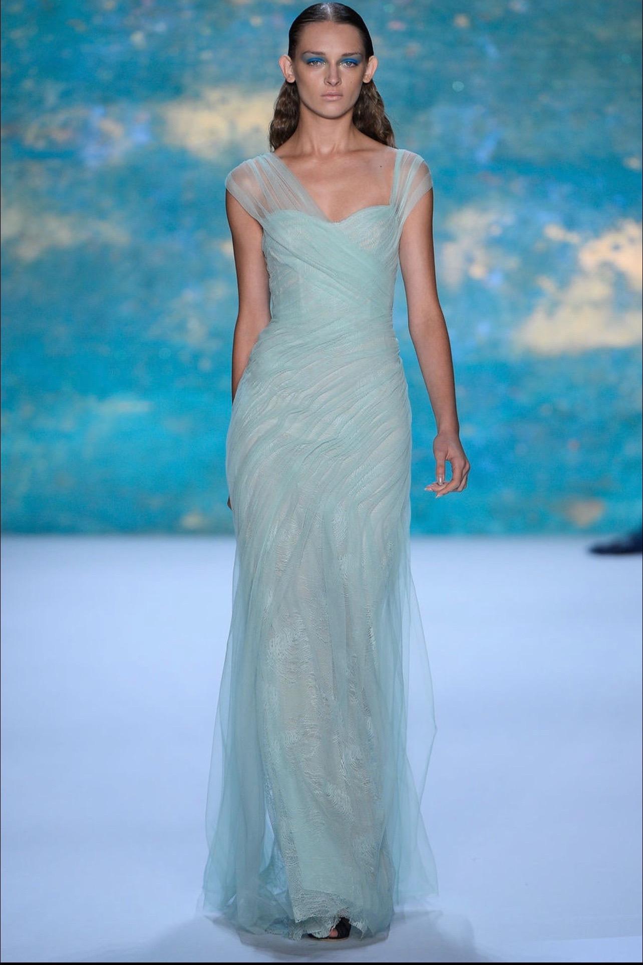 Gorgeous MONIQUE LHUILLIER Runway Spring 2013 runway lace gown ! Beautiful rich emerald green color looks great on any skin tone. Pictured on the runway in sky blue. Flattering ruched body with layers of tulle layered over lace. Inner boned bodice