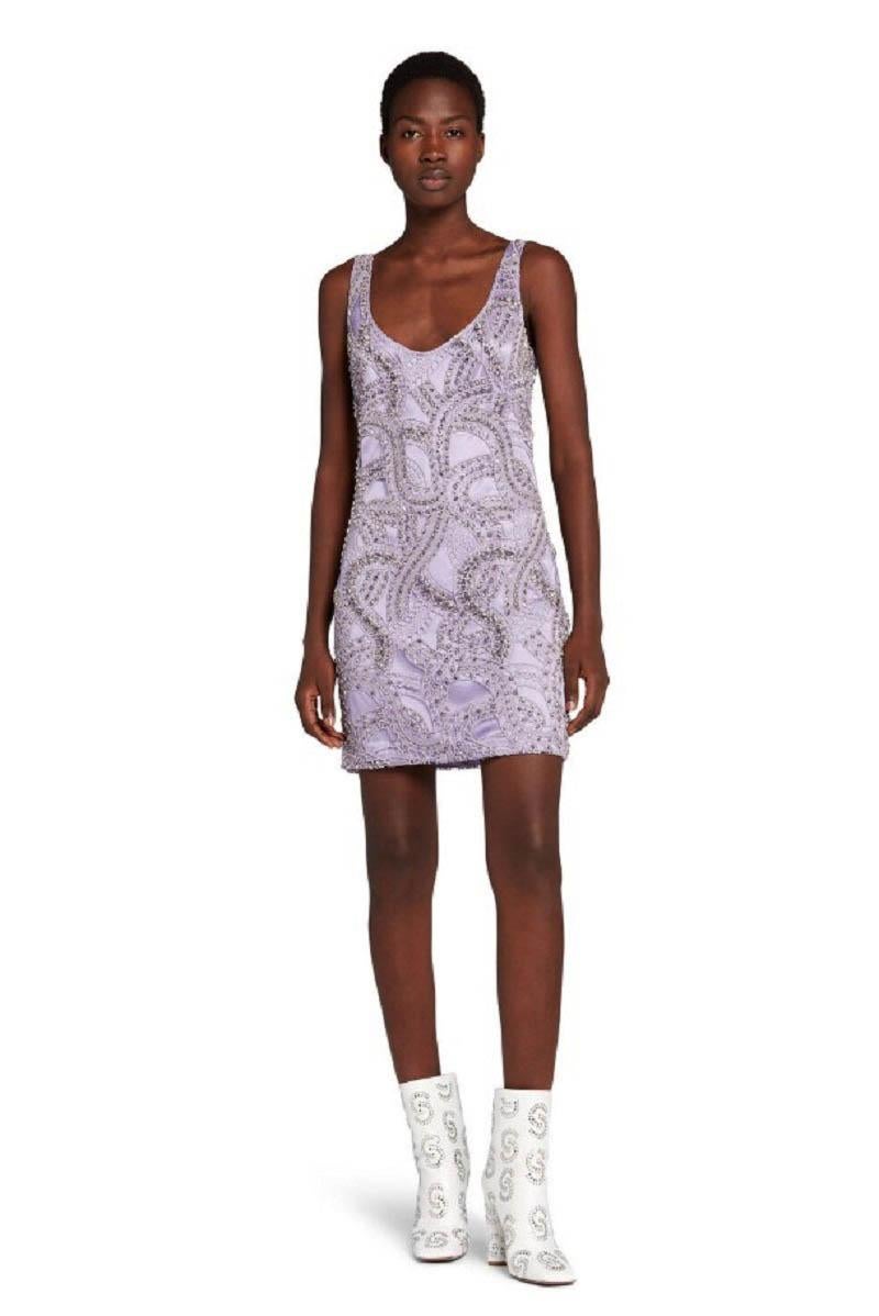 NWT Roberto Cavalli Crystal-Embellished Evening Mini Dress
Designer color - Lilac 
Italian sizes available 40 and 42 - US 4 and 6.
An invisible mesh, fully embroidered and decorated with purple and clear crystals, covers the dress in light purple