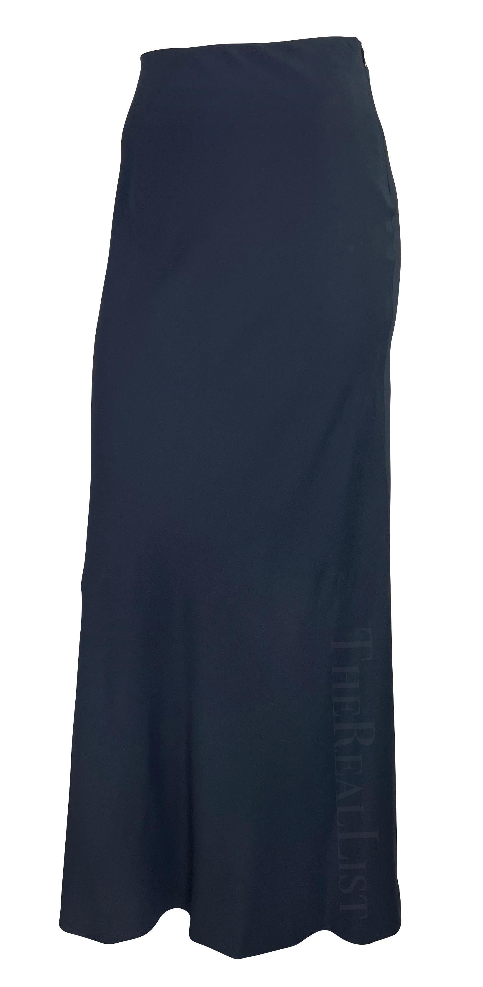 Presenting a stunning navy Gucci maxi skirt, designed by Tom Ford. From the Spring/Summer 1996 collection, this Tom Ford-designed piece fits perfectly at the hips before cascading into a flared cut. This gorgeous, unworn skirt still features its