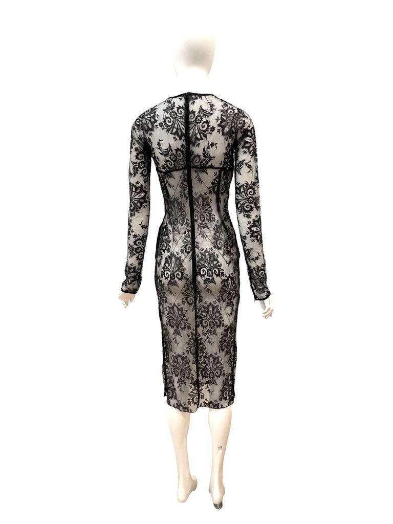 NWT S/S 1999 DOLCE & GABBANA Sheer Patent Lace Dress
Condition: Excellent, New with tags
Viscose/Polyurethane/Nylon
Made in Italy
Bust: 34