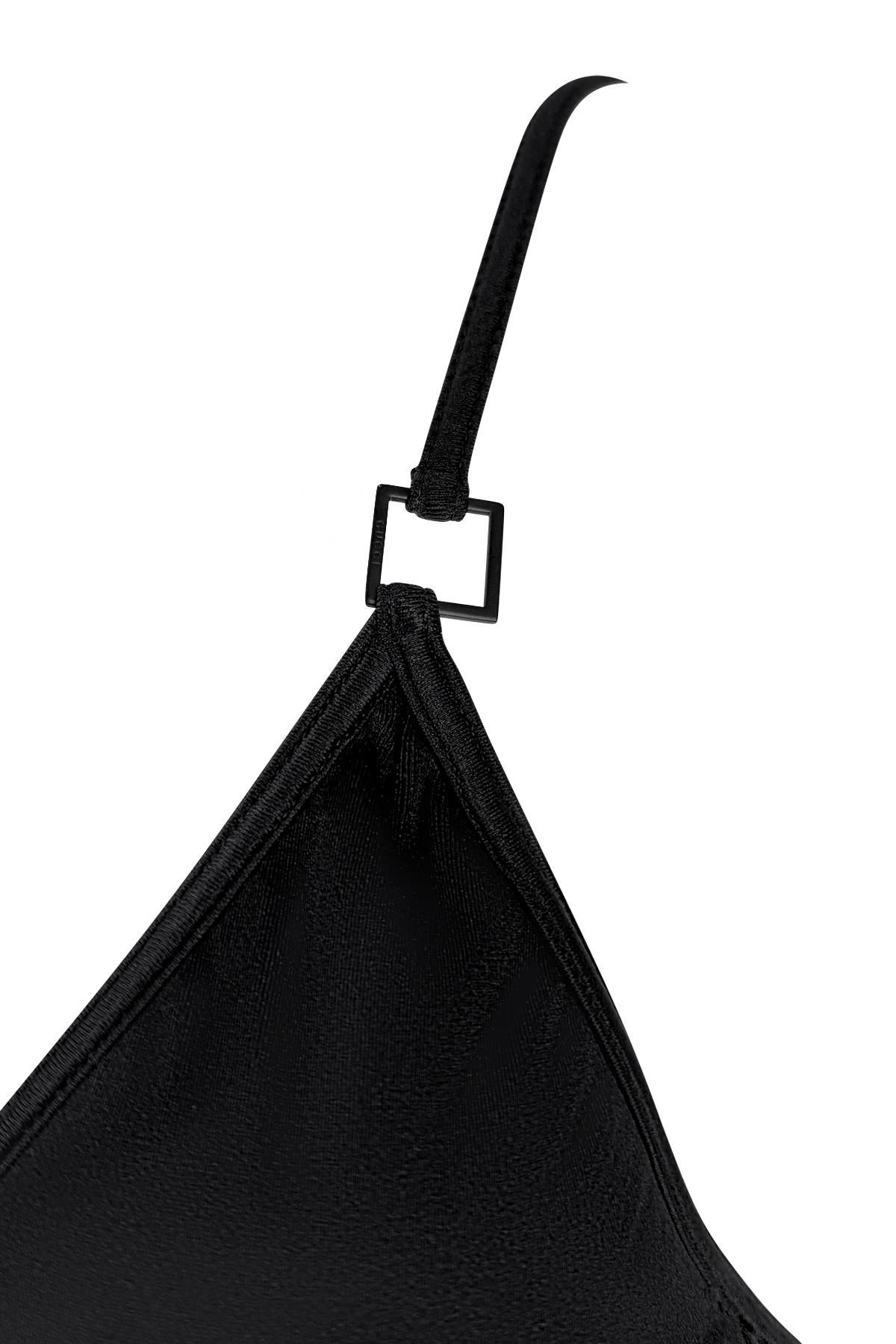 From Gucci’s Spring/Summer 2001 collection by Tom Ford, this new-with-tags black one-piece swimsuit features a sleek silhouette with a deep V neckline, square branded accents, sewn in breast cups, and high-cut legs. 

Approximate measurements:
Size