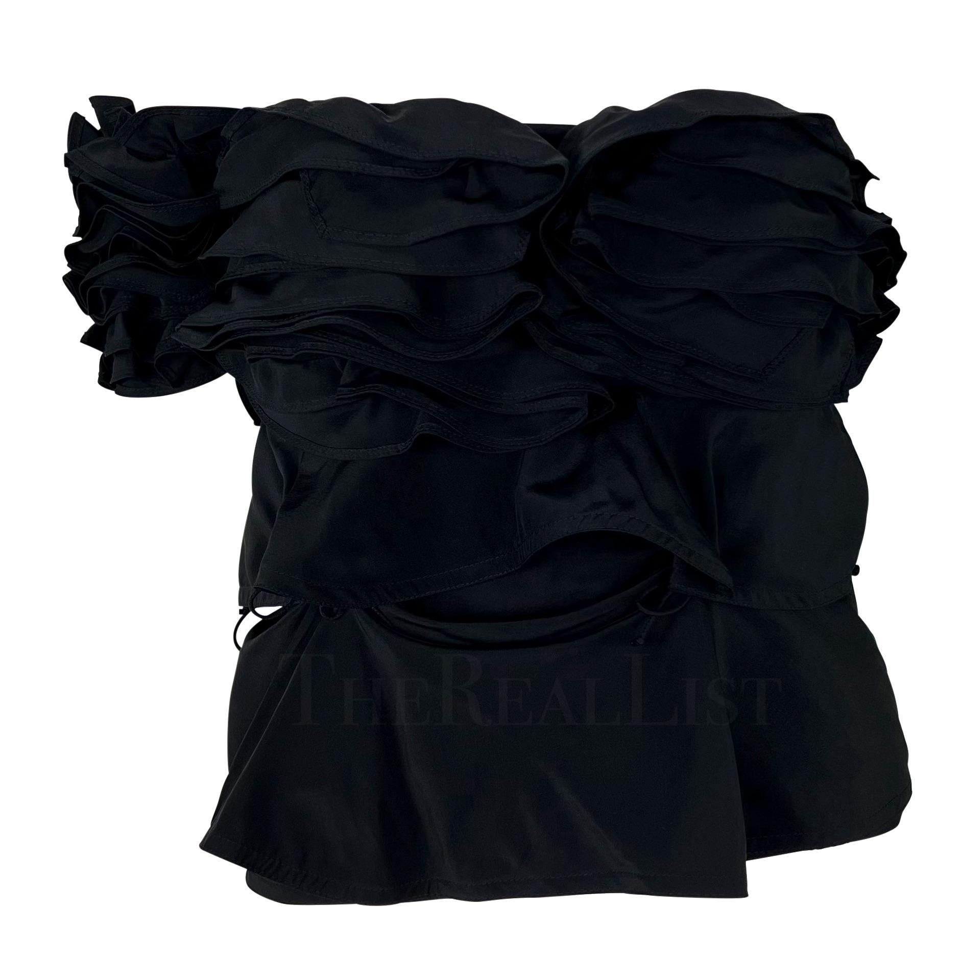 Presenting a fabulous sleeveless black silk Yves Saint Laurent Rive Gauche top, designed by Tom Ford. From the Fall/Winter 2003 collection, this chic black top is constructed of layers of lightweight silk, some connected with little ties, that