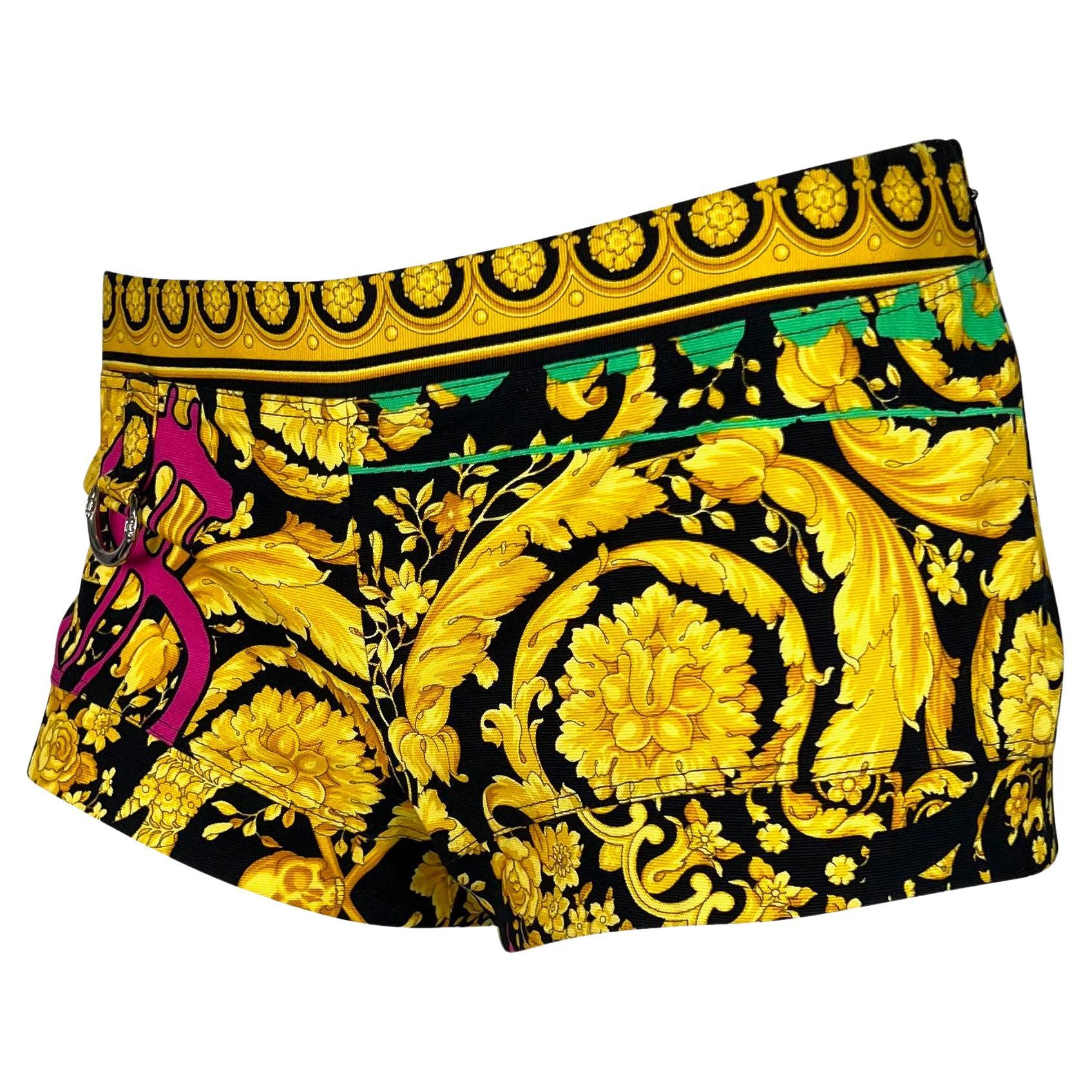 Presenting a pair of baroque Versace shorts, designed by Donatella Versace. From the Spring/Summer 2005 collection, these Choas Couture mini shorts boast the brand's famous gold and black baroque pattern. Donatella reimagined this print outfitting