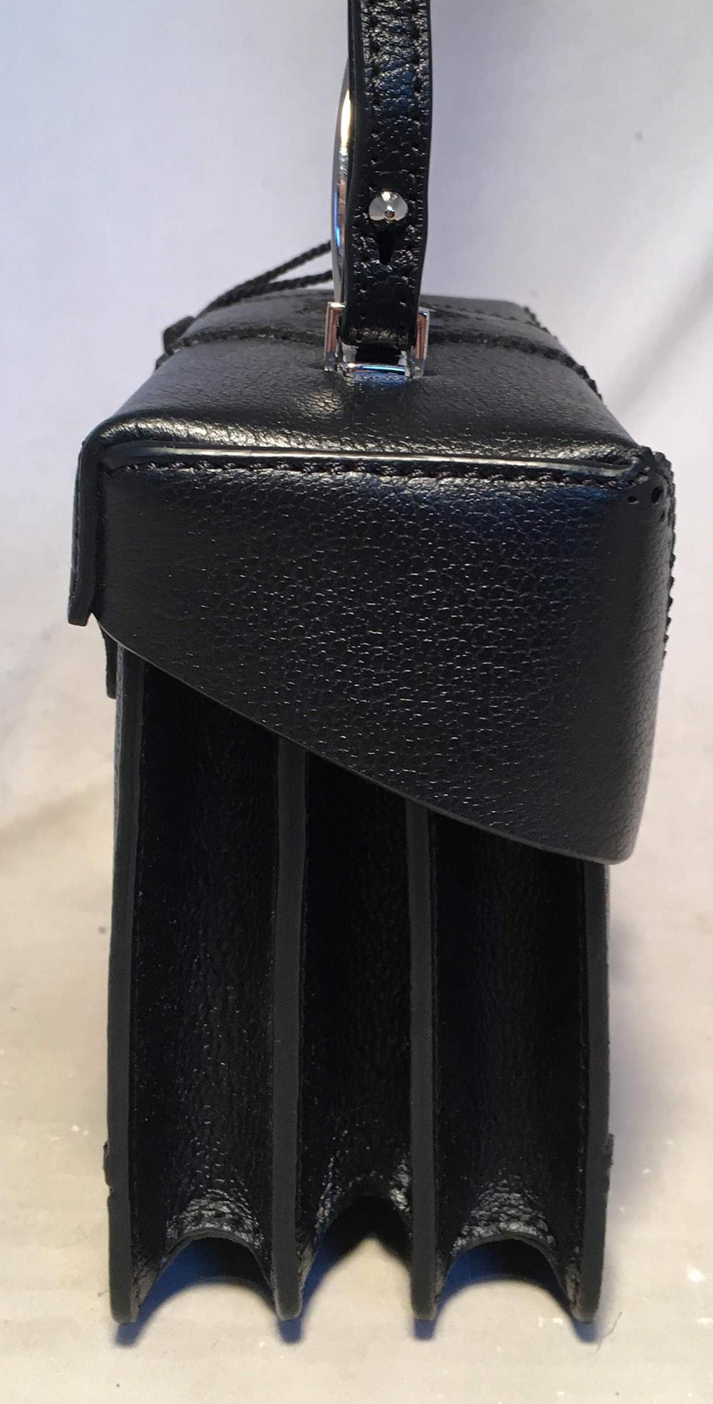  NWT The Volon Black Leather Alice Crossbody Box Shoulder Bag in like new condition. black leather exterior trimmed with embossed leather, a silver leather heart detail on top and trimmed with silver handle and matching black leather shoulder strap.