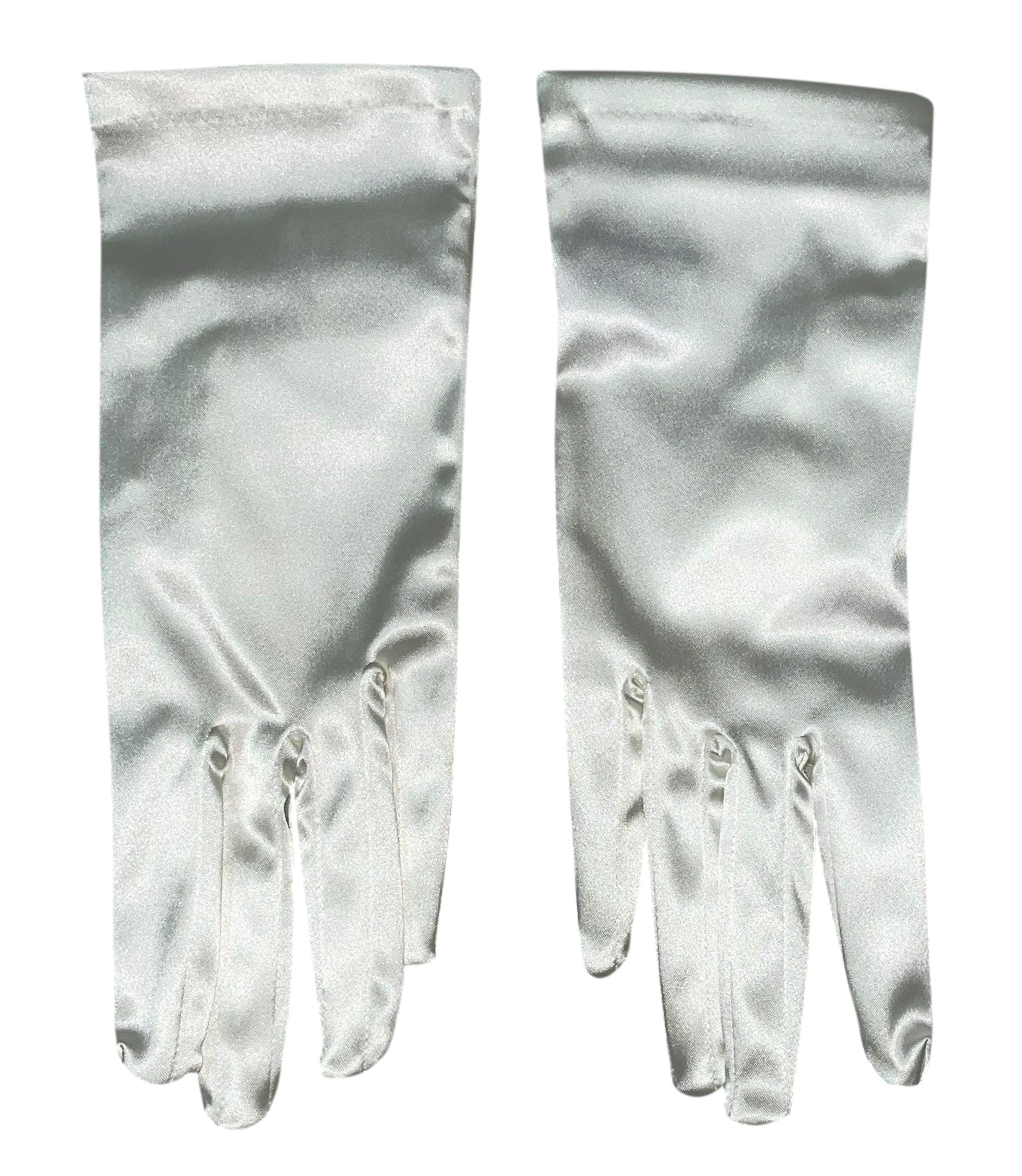 DESIGNER: 1990's Dolce & Gabbana- 2 pair of gloves, 1 short and 1 long

Please contact us for more images and/or information.

CONDITION: Unworn comes with tags and boxes

FABRIC: Acetate-Nylon-Spandex

COUNTRY: Italy

SIZE: M but runs small! fits