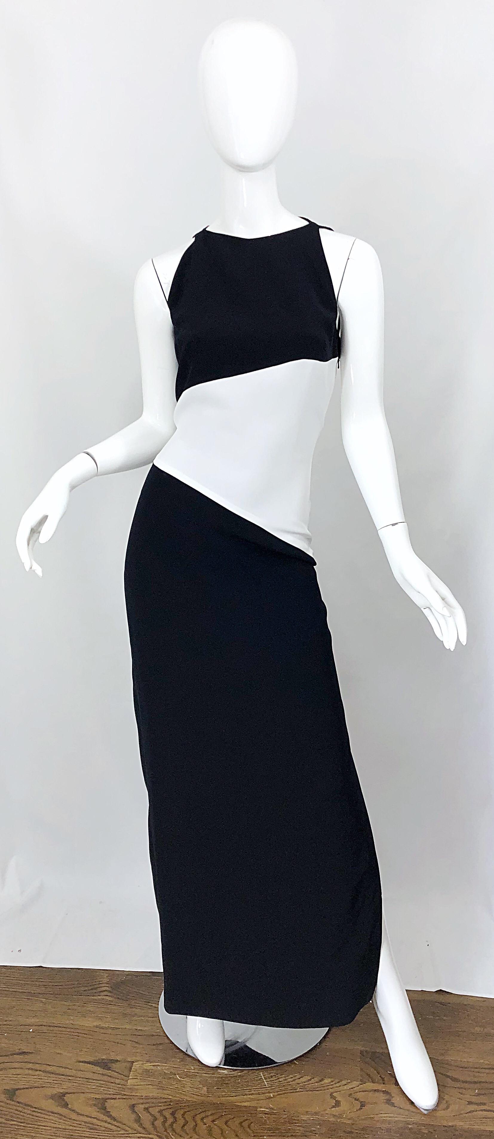 Beautiful and flattering brand new with original store tags vintage BOB MACKIE black and white color block Size 8 evening gown! Features blak crepe at bust, white crepe at waist, and black crepe skirt. High neck with a slit at the left leg that