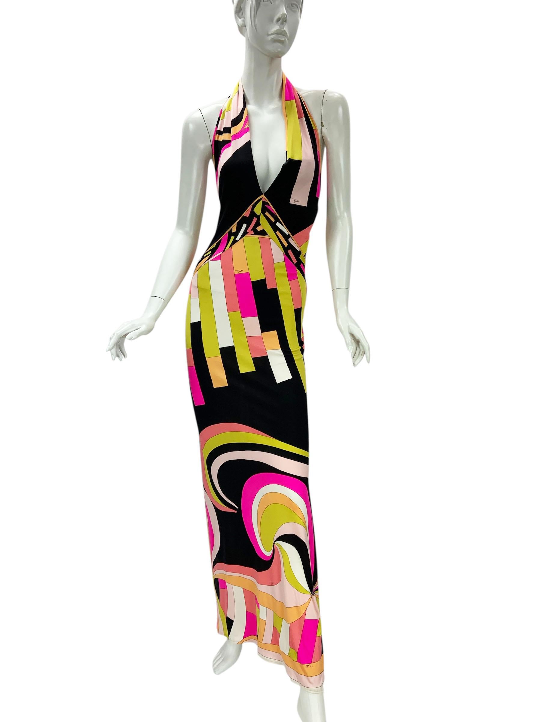 Vintage Emilio Pucci Plunging Halter Silk Print Jersey Maxi Dress
US size 6 ( UK 8, Italian 40, French 36 )
Make a striking statement with this vintage Emilio Pucci halter dress, showcasing the brand’s signature bold and colorful geometric patterns.