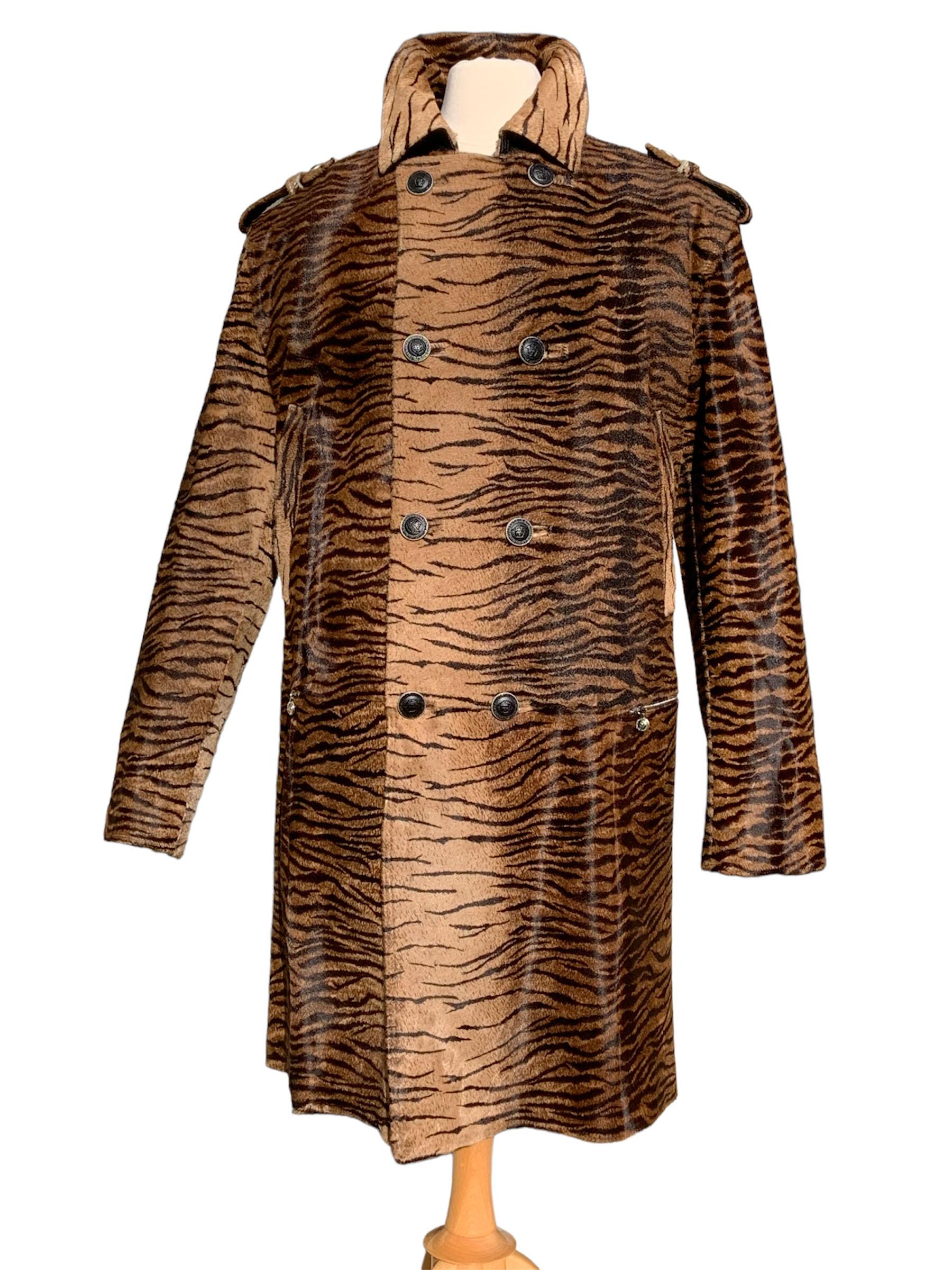 NWT Vintage Gianni Versace White Label Zebra Print Fur Leather Men's Coat
F/W 1999 Collection
Iconic Zebra Print Leather Pony Hair, Double Breasted, Four Pockets, Epaulets, Back Slit with Buttons, Zip Closure at Sleeves, Decorative Belt, All Buttons