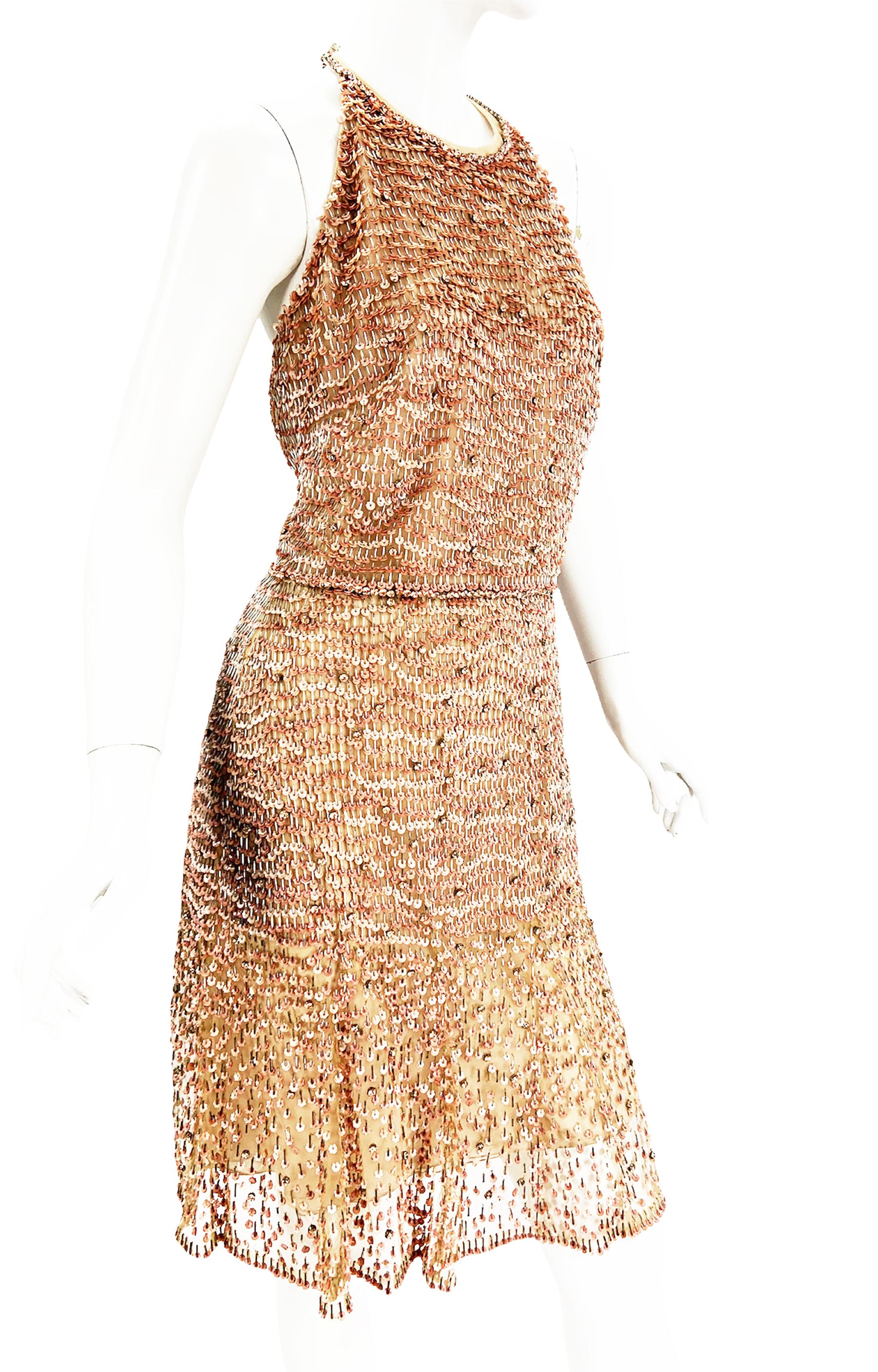 NWT Vintage Valentino Fully Beaded Cocktail Dress
Designer size - 40
Blush Pink Colors Paillette of Crystals, Tube Beads and Flower-shape Sequins Embellishment over the Nude Tulle.  
Bow Accent on the Neck, Fully Lined, Side Zip