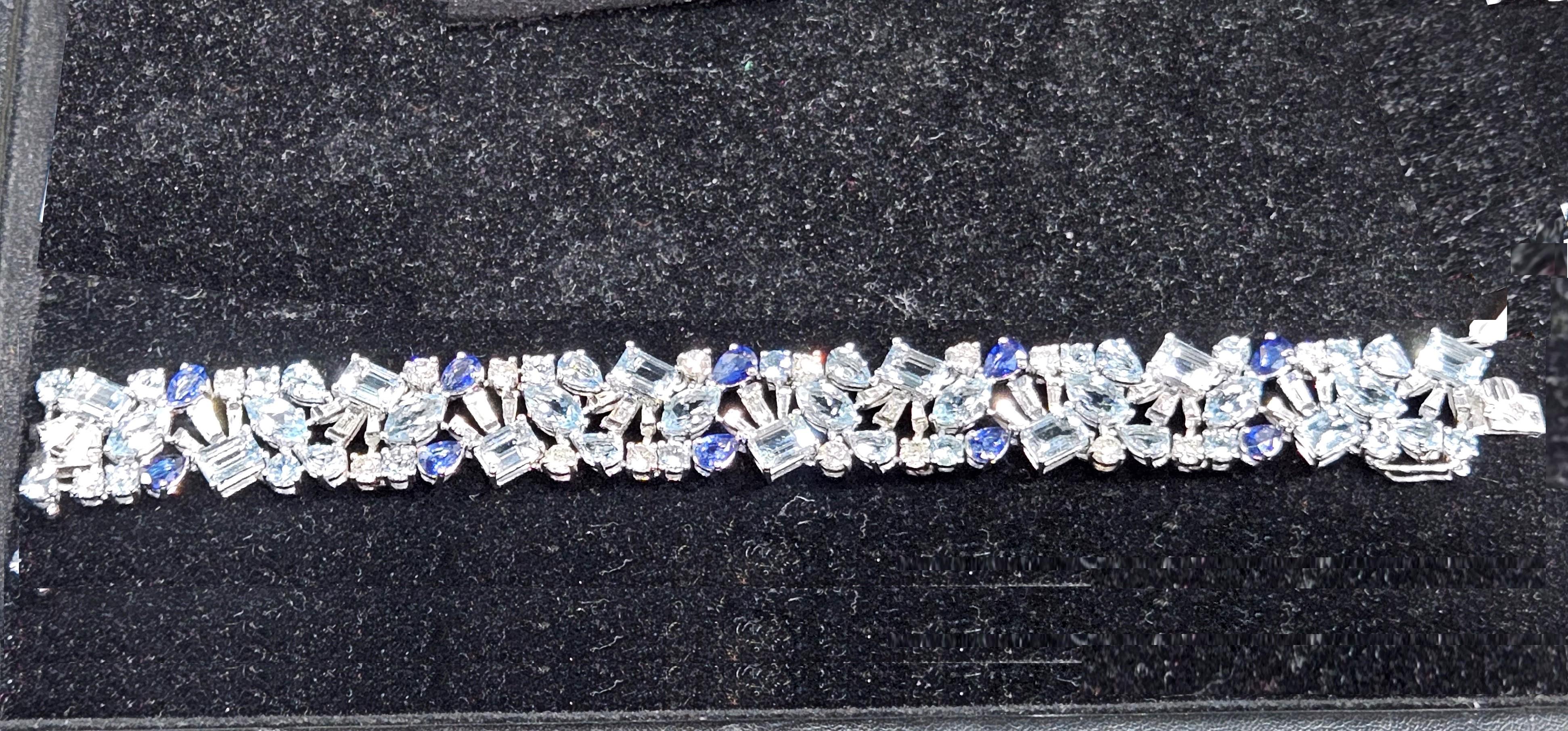 The Following Item we are offering are this Rare Important Radiant White Gold Gorgeous Glittering and Sparkling Magnificent Fancy Aquamarine, Blue Sapphire, Diamond Bracelet. Bracelet contains a Beautiful Array of Rare Fancy Large Aquamarines with