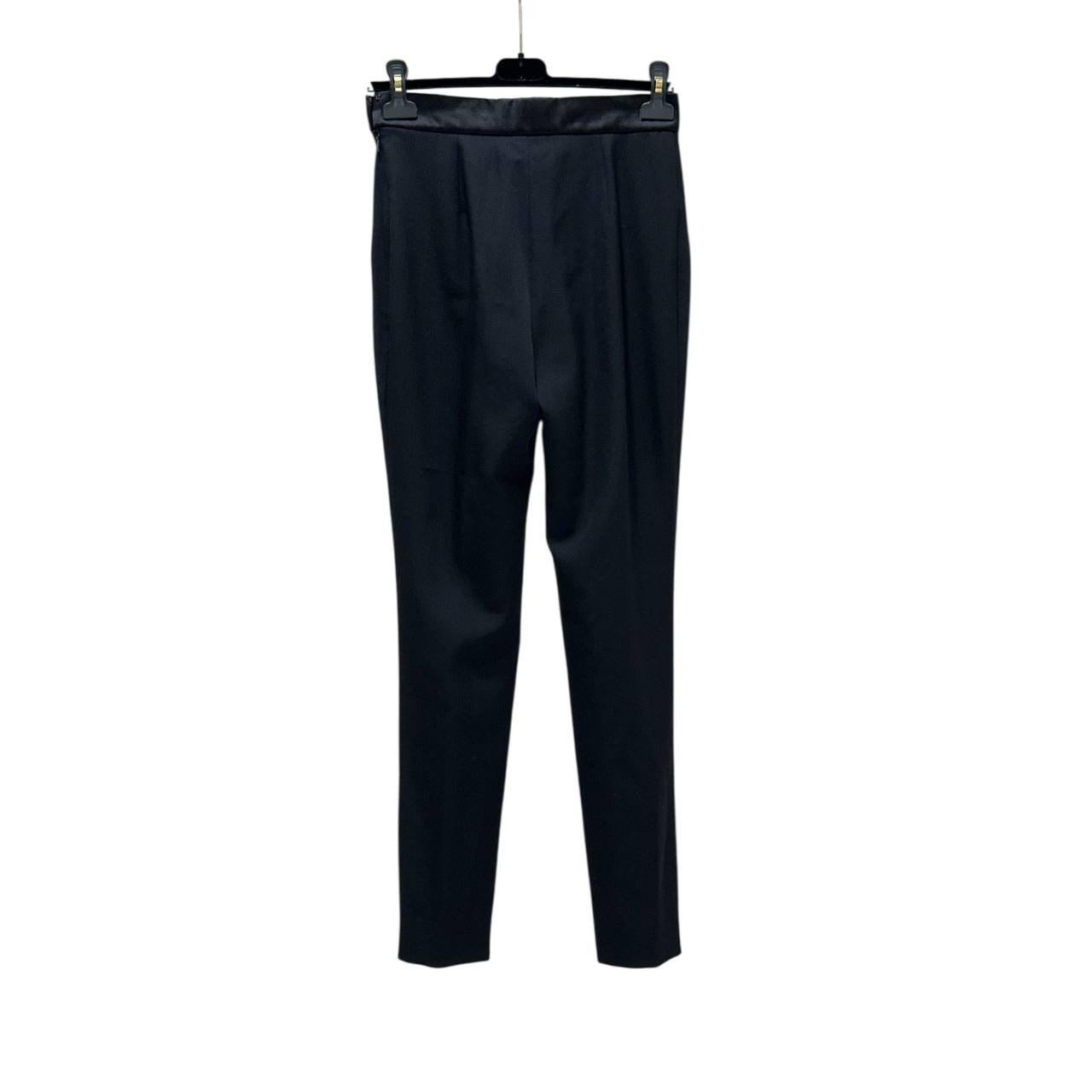 Elevate your wardrobe with these luxurious Chanel wool pants
These trousers are brand new with tags and have never been worn. 
Perfect for adding a touch of elegance to any outfit. 
Note that the hanger is not included. 