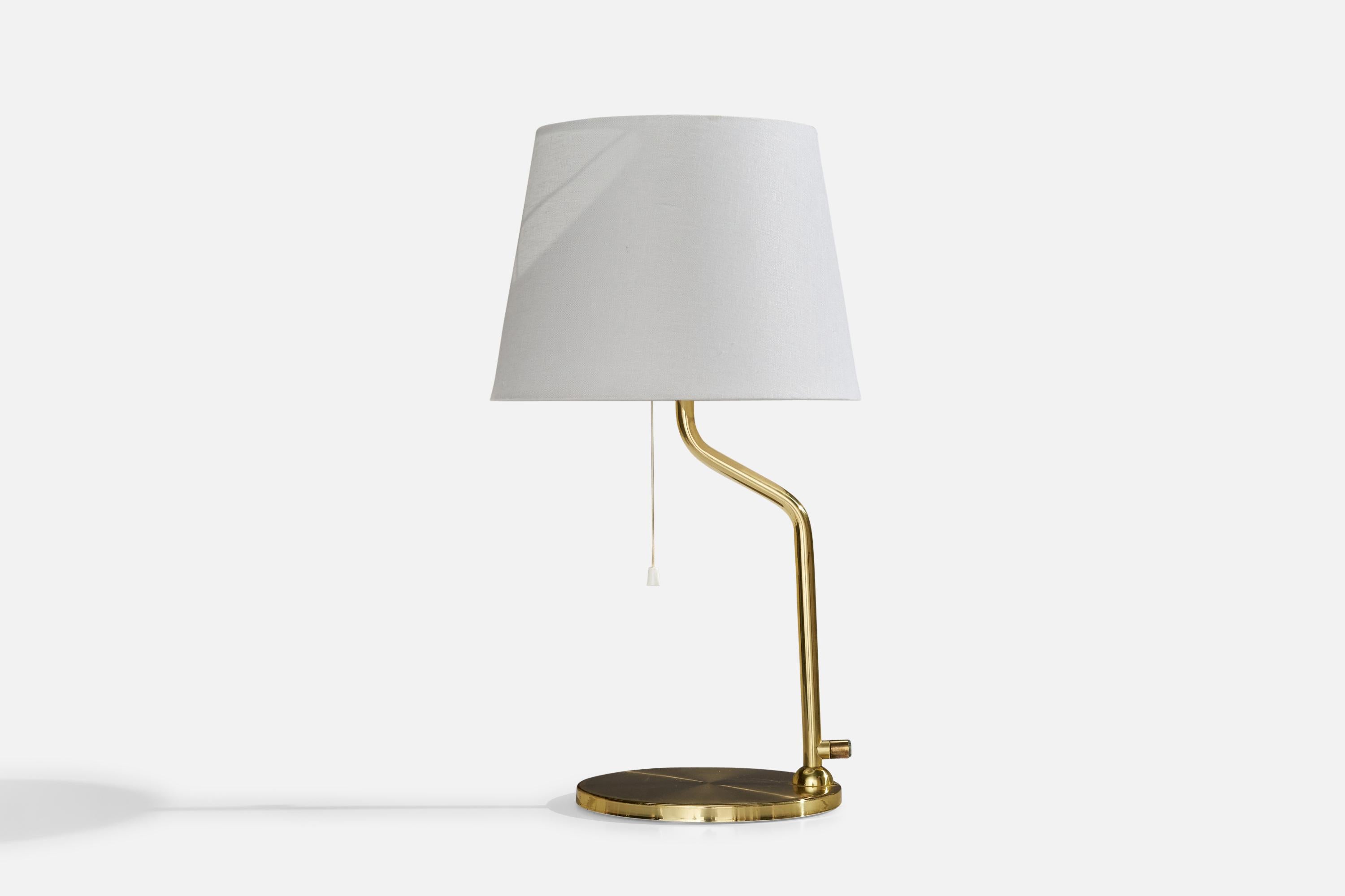 A brass table lamp designed and produced by Nya Öia, Sweden, 1970s.

Dimensions of Lamp (inches): 21.75”  H x 8.5” Diameter
Dimensions of Shade (inches): 9”  Top Diameter x 12”  Bottom Diameter x 9” H
Dimensions of Lamp with Shade (inches): 22”  H x