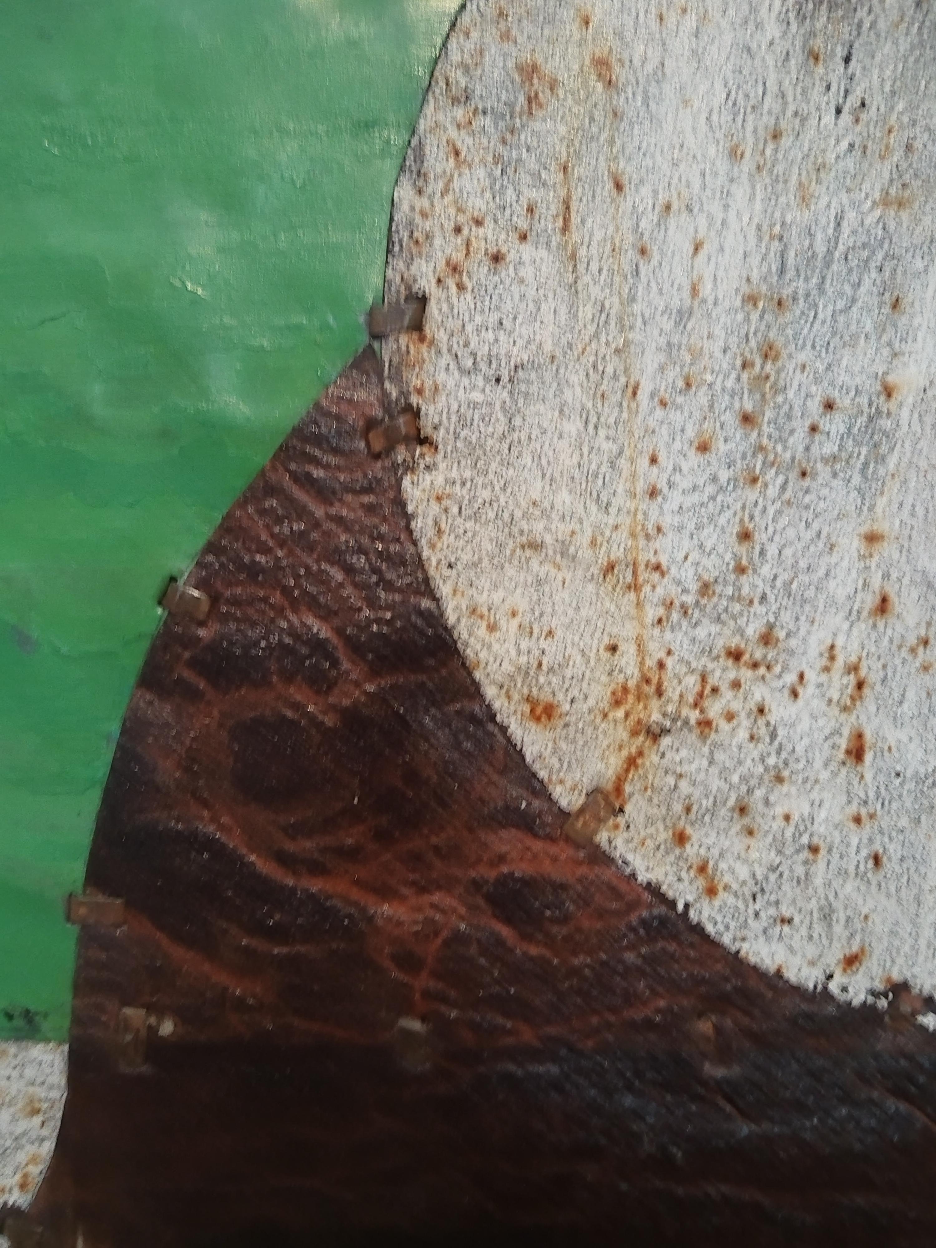 Composición abstracta de metal oxidado verde y naranja 