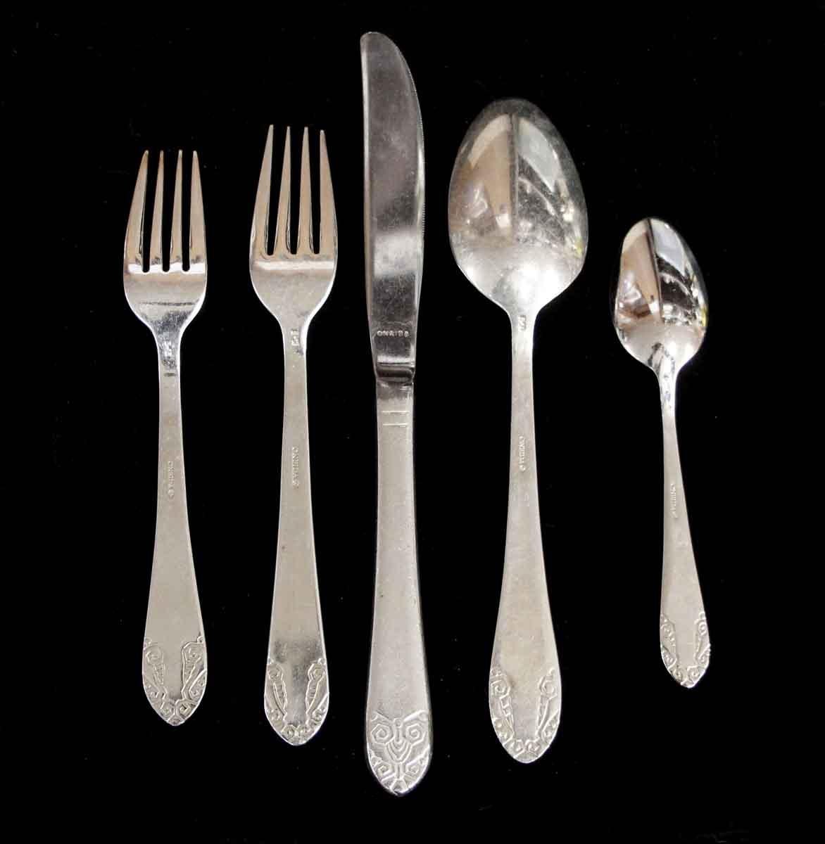 Five piece flatware place setting from the NYC Waldorf Astoria Hotel. The set includes a dinner knife, dinner fork, tablespoon, teaspoon and salad fork. They are made of silver plating over steel. Limited quantities. A Waldorf Astoria authenticity