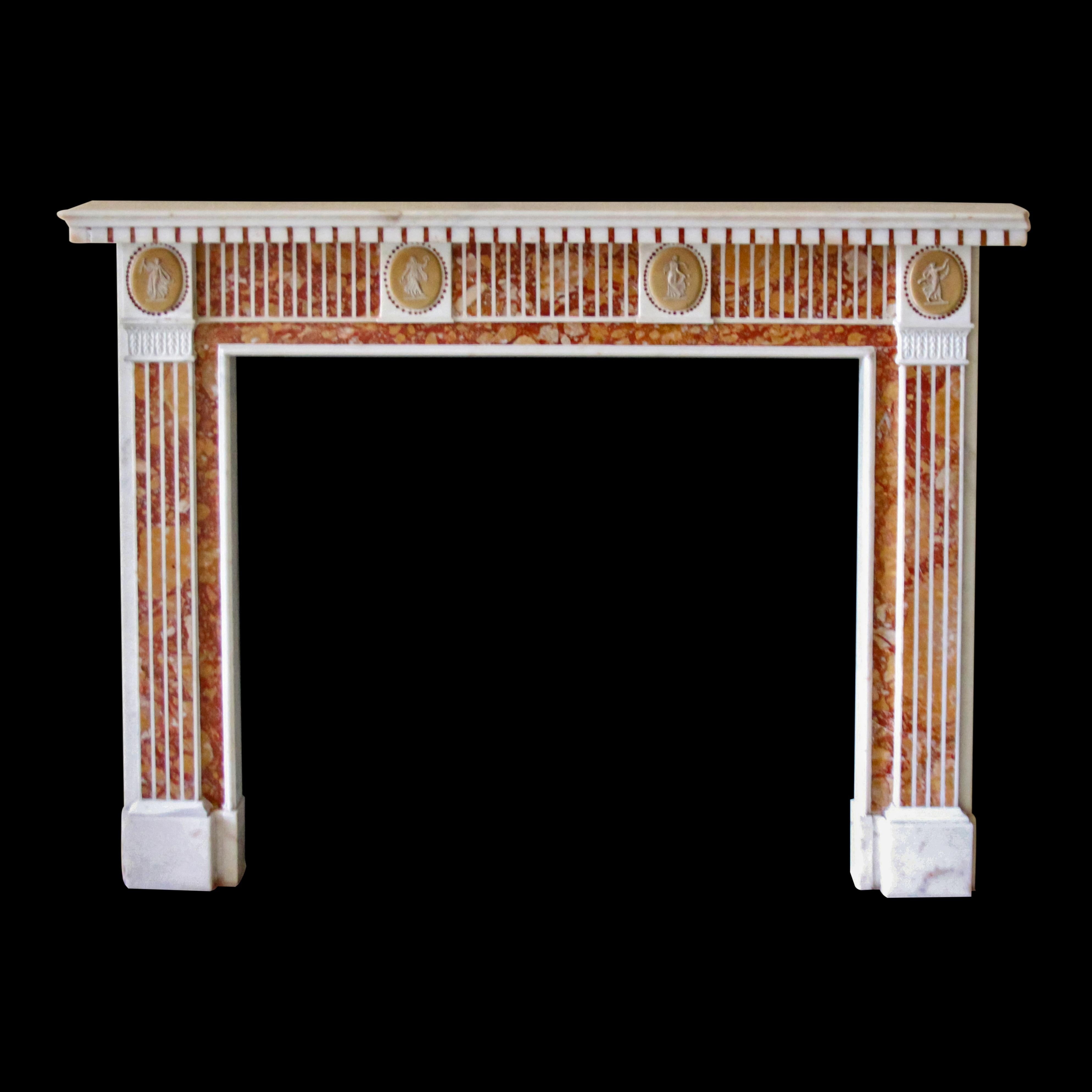 Red, yellow and white decorative marble mantel. This is original to suite 37F of the NYC Waldorf Astoria Hotel. The NYC Waldorf Astoria opened in 1931 but sourced antique marble mantels from Europe at the time so each suite had a distinct look from