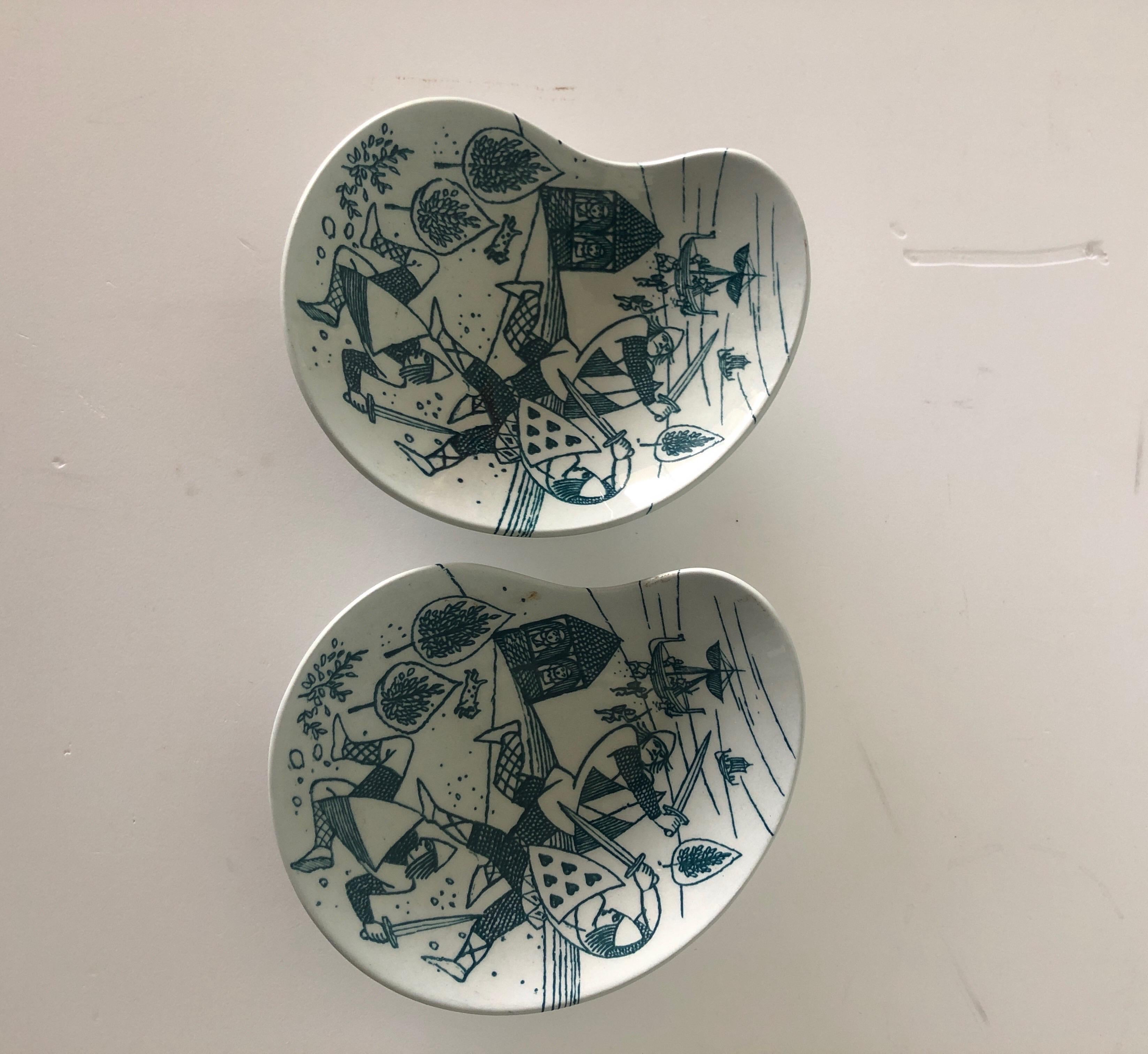 Nymolle Art Faience Hoyrup Oval dishes
 Art Faience. Made in Denmark. Stamped.
Delightful Danish Nymolle Art Faience Hoyrup small oval dishes. The kidney shaped dish has bright color. The scenes depicted are a warrior battle with Viking ships in