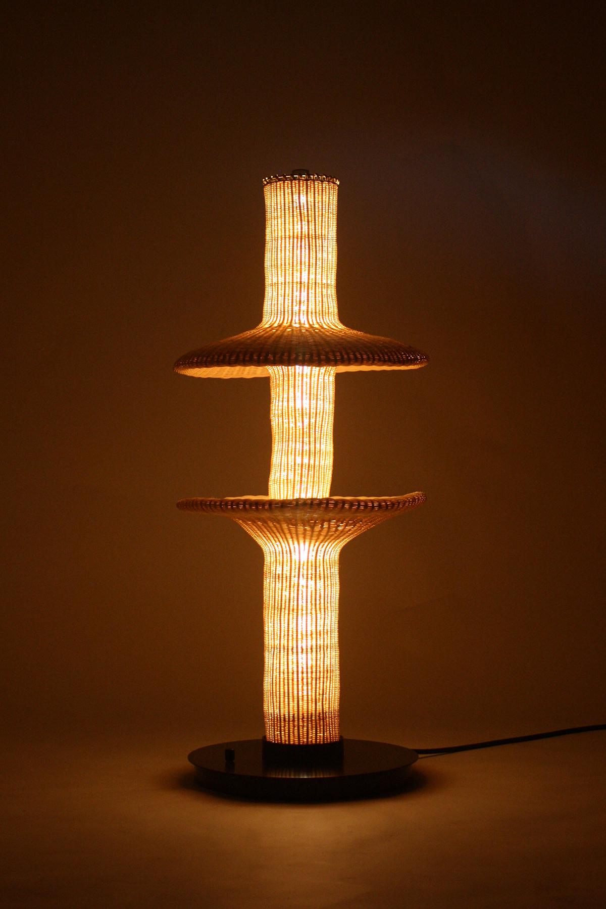 Nymph Floor Lamp by Laylo Studio
Limited Edition
Dimensions: D 50 x H 106.6 cm.
Materials: Woven reed, blackened & brushed stainless steel.

As related to insects, a nymph is sexually immature and characterized by distinct body morphology from its