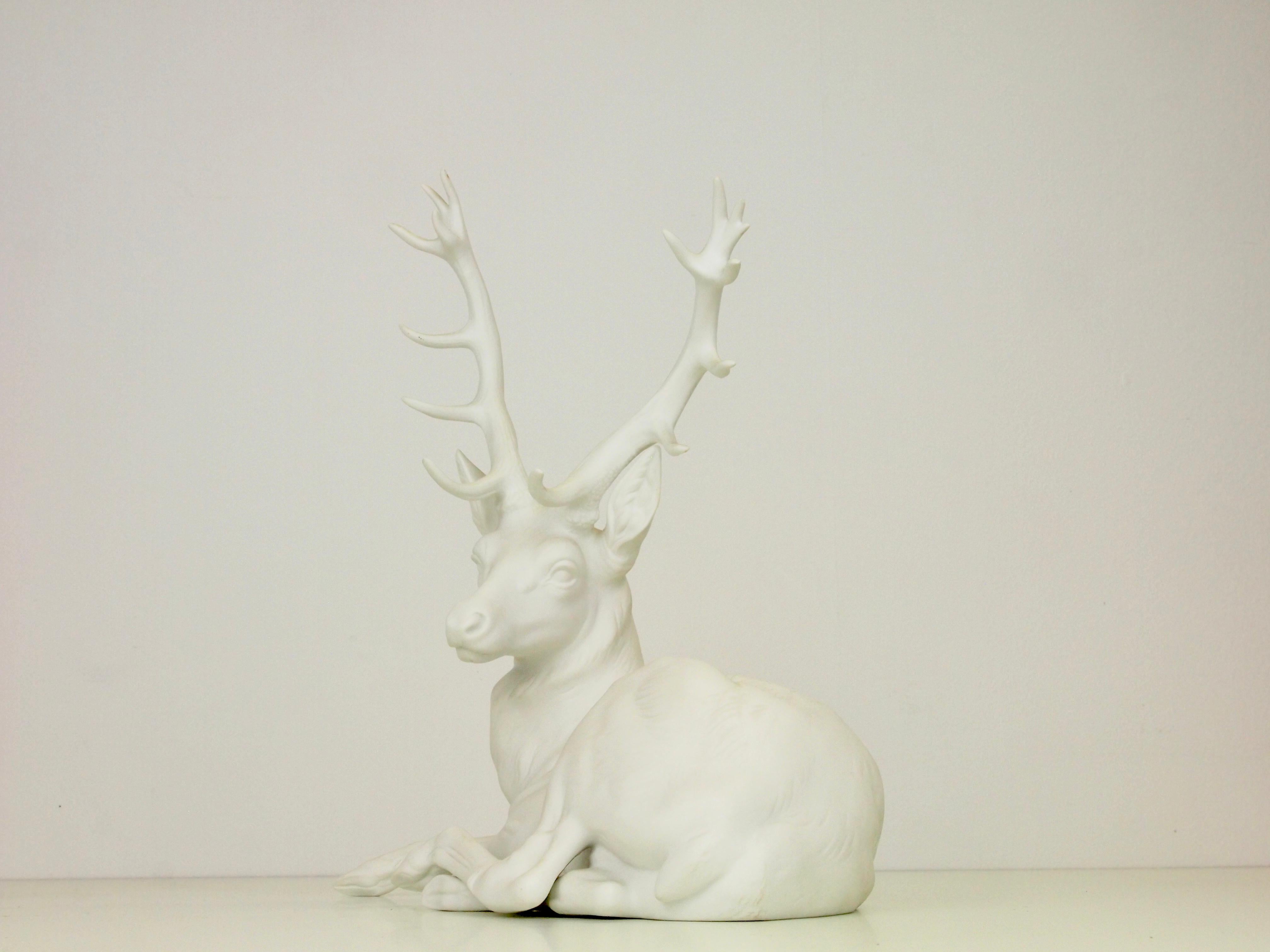 white deer figurine