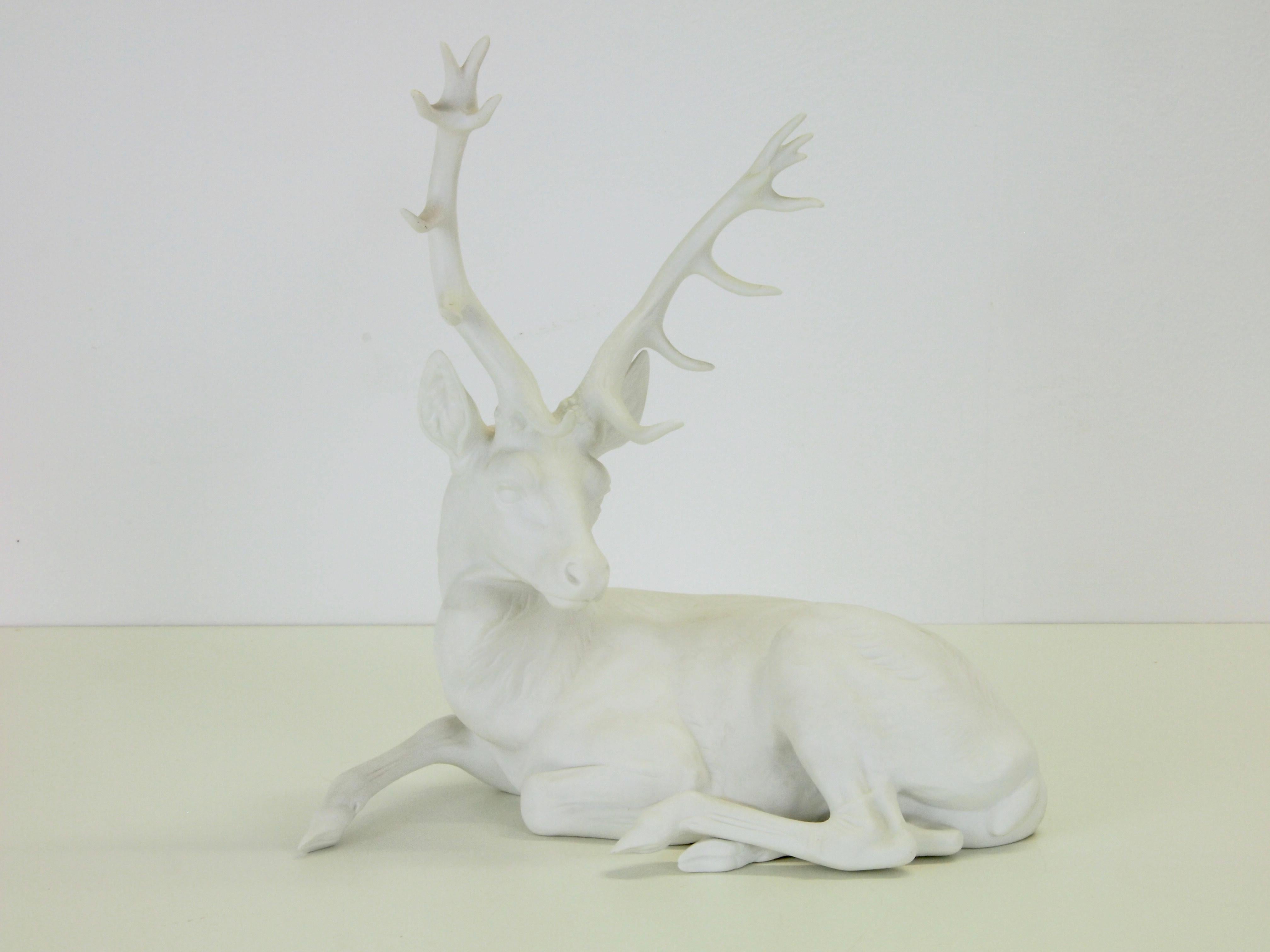 white deer figurine