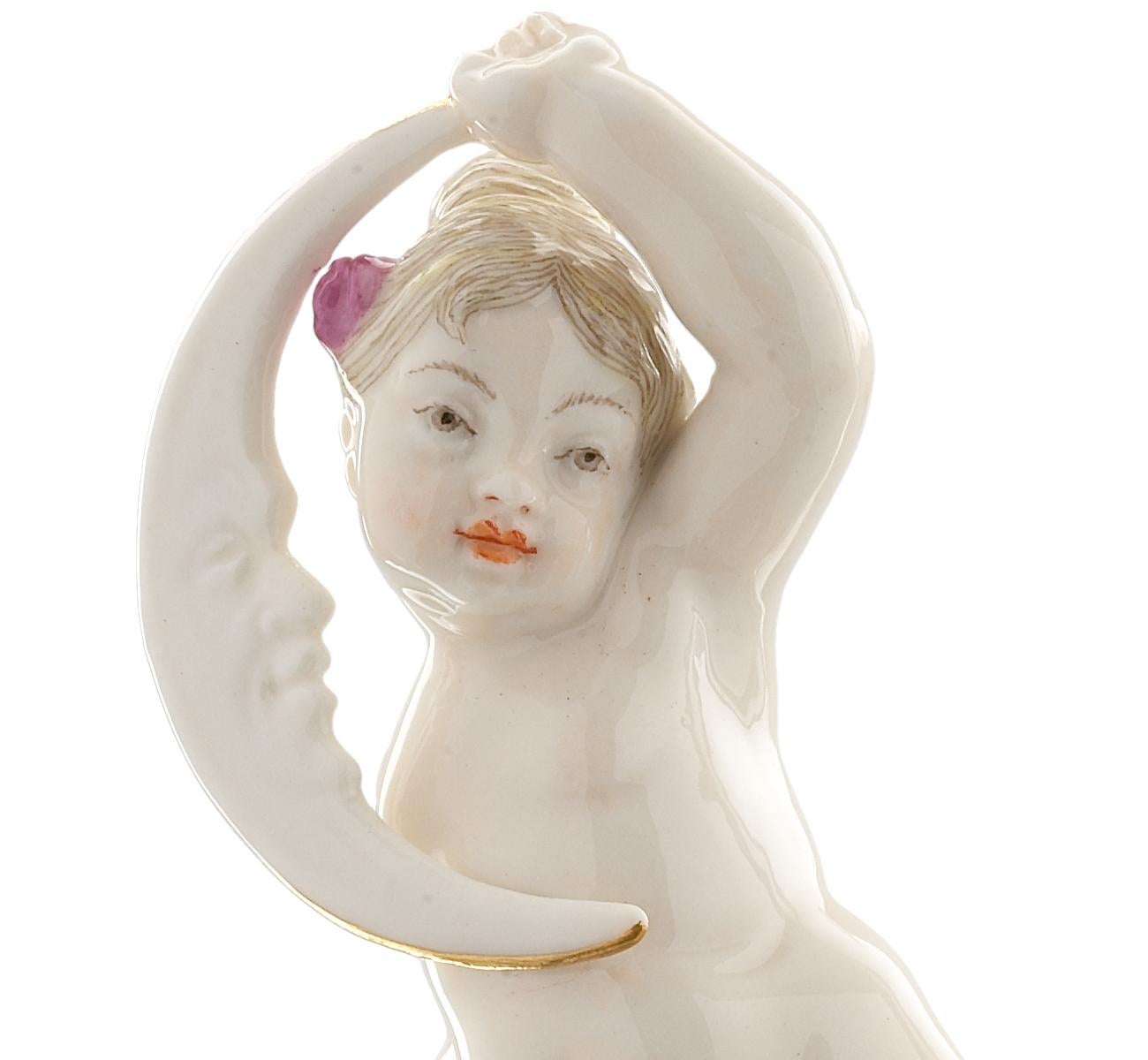 Rococo Nymphenburg Porcelain handcrafted and hand painted cherub on a pedestal For Sale