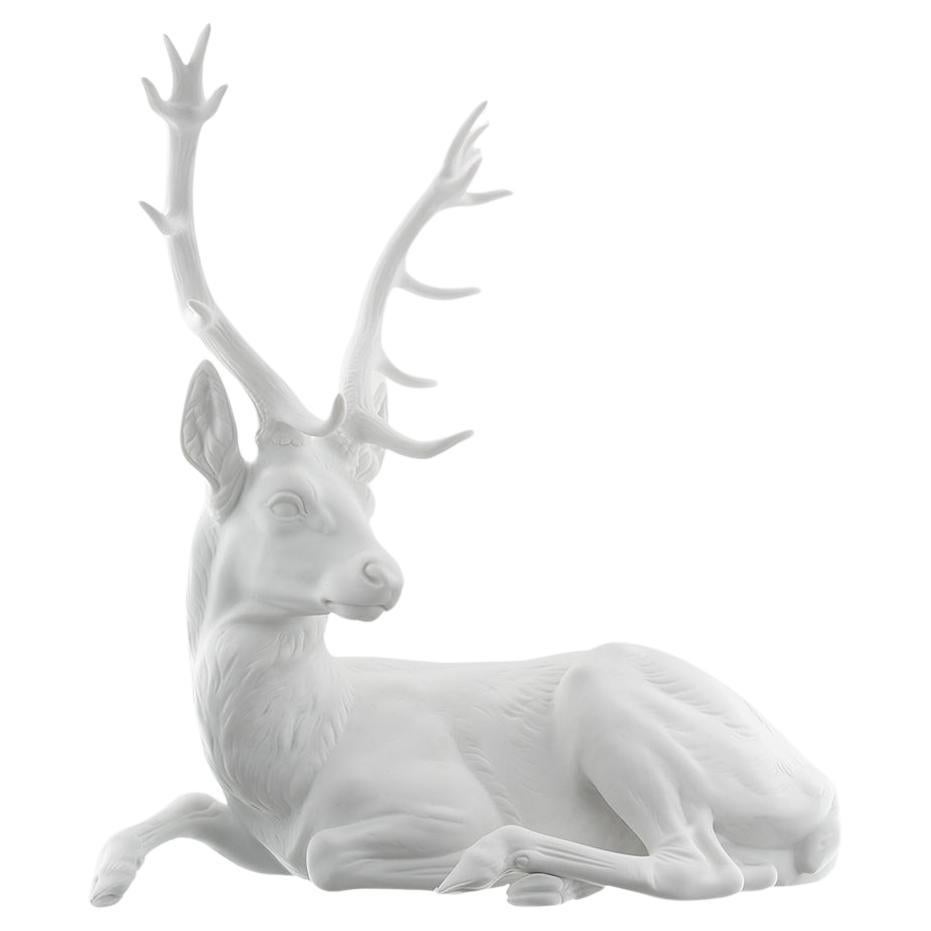 Nymphenburg Porcelain ciervo tumbado en bisque blanco -