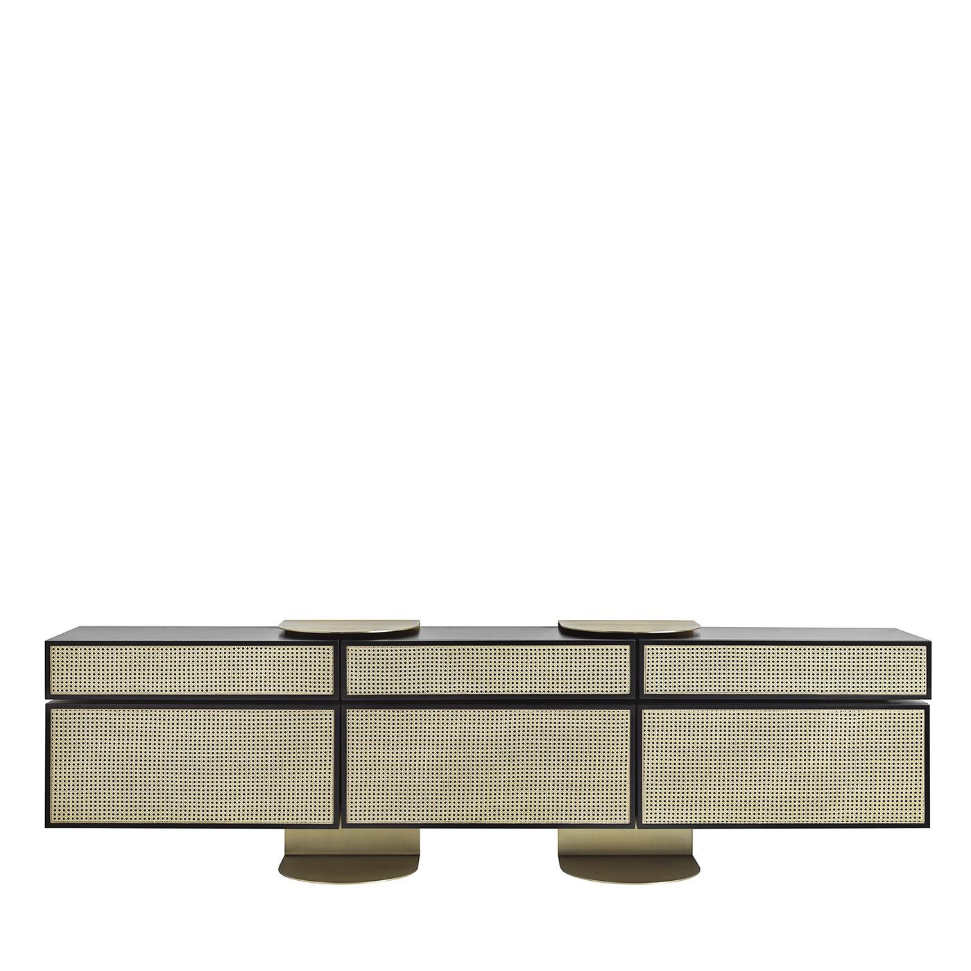 A balanced and elegant encounter between architecture, design, and craftsmanship, this exquisite sideboard is deftly handmade of first-rate lacquered wood and Vienna straw. Sleek and modern, it can be wall-mounted thanks to a satin brass-finished