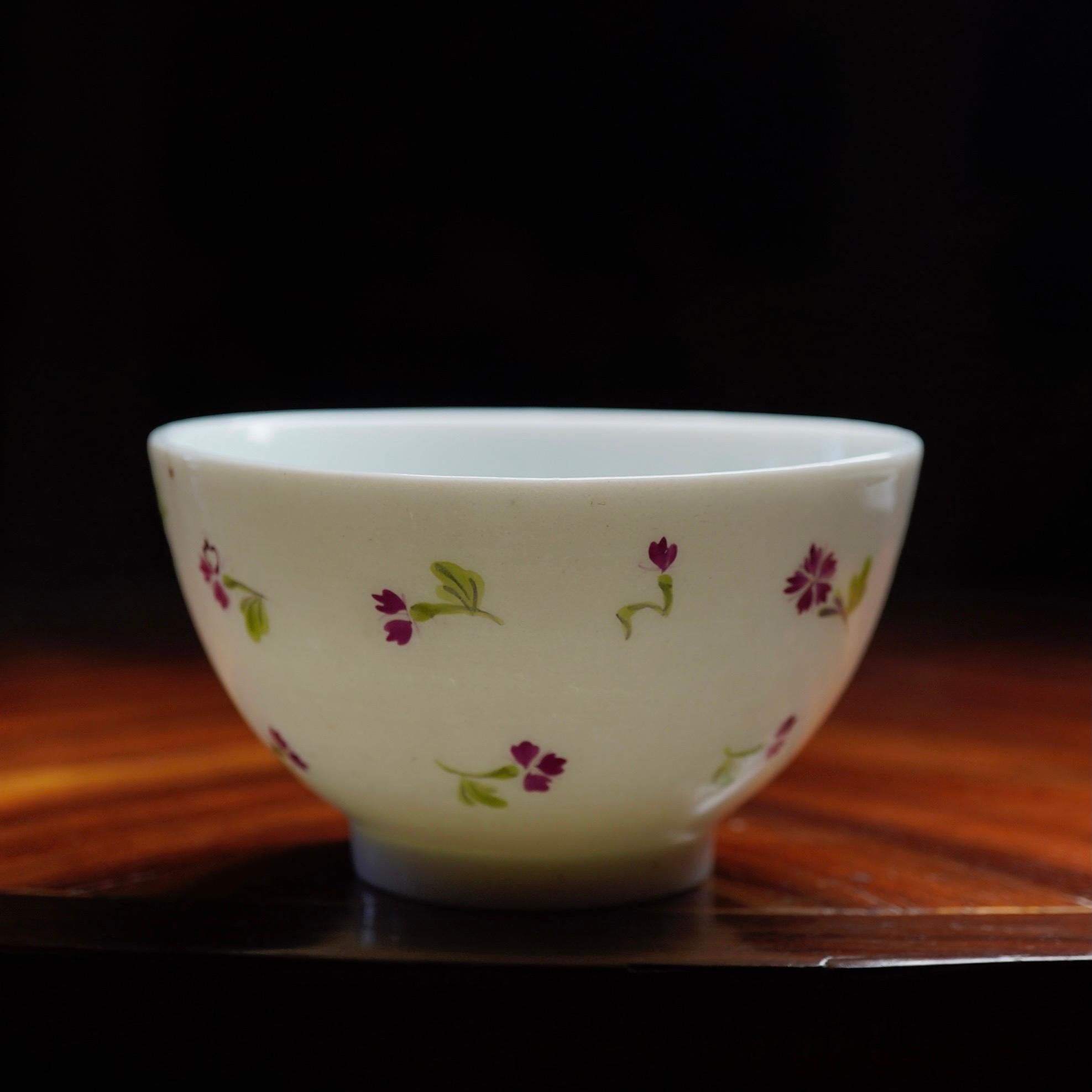 Nyon tea bowl, painted with a purple and green cornflower sprig pattern in the French manner. 
Unmarked, 
circa 1790.
  