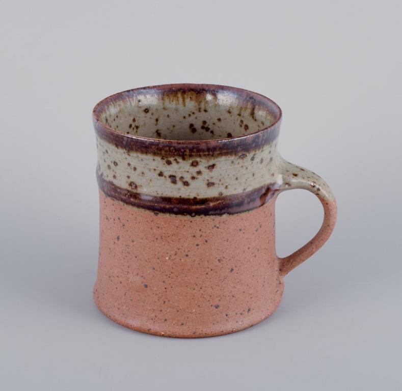 Nysted Ceramics, Denmark.
Three ceramic cups in brown shades. Handmade.
From the 1960s/70s.
In perfect condition.
Signed.
Dimensions: H 9.5 cm x D 8.5 cm (without handle).
