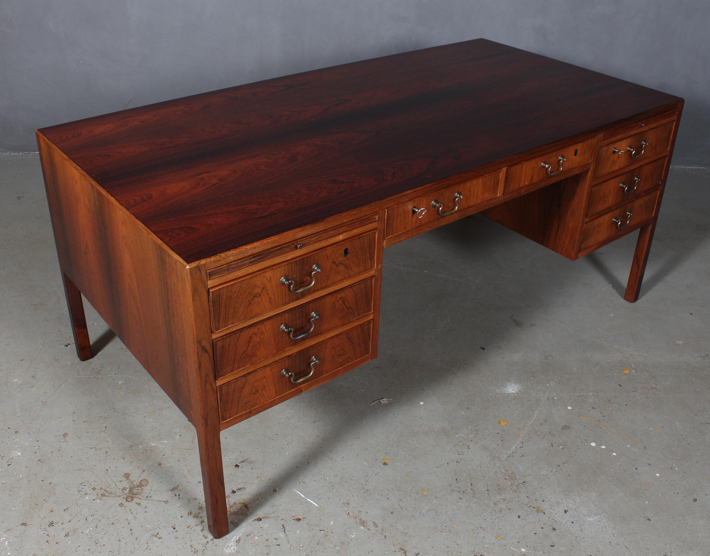 O. Bank Larsen writing desk in rosewood. With drawers, doors and trays. Rich details. Two keys included.

Made in the 1950s in the style of Ole Wanscher.