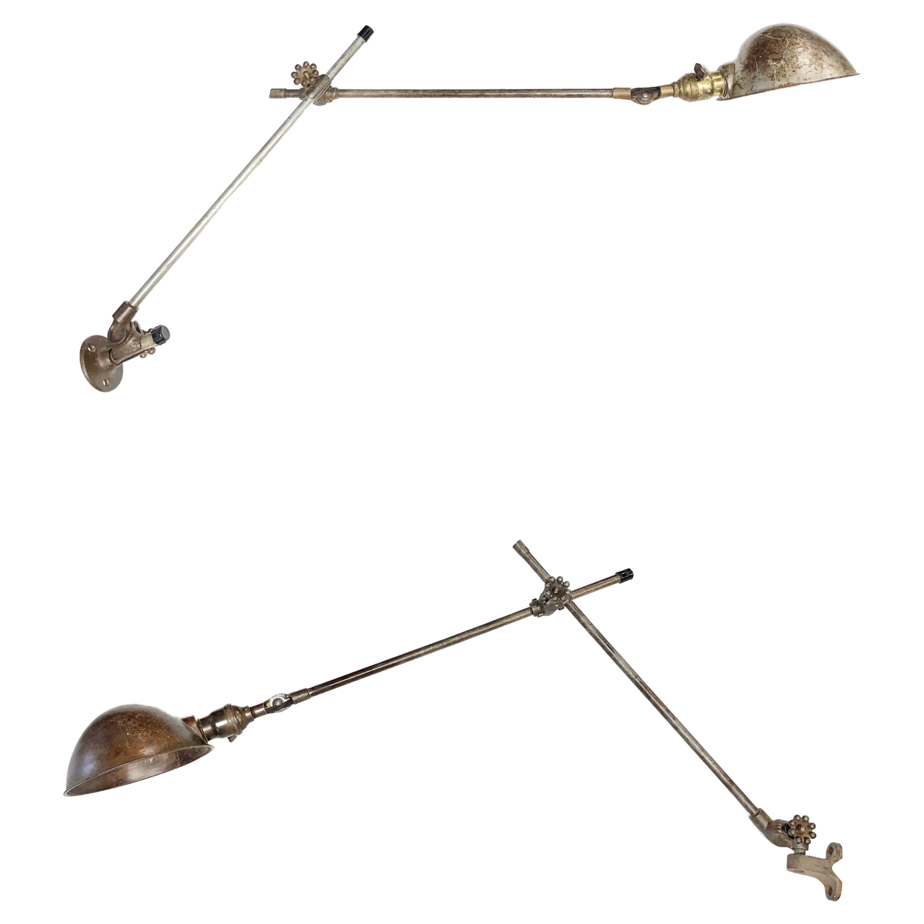 O.C. White Near Pair of Articulating Wall Lamps
