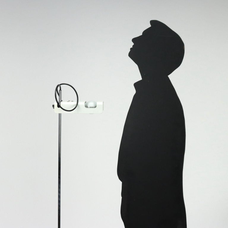 Floor lamp with adjustable diffuser and adjustable position; chromed and enamelled metal, aluminum.
