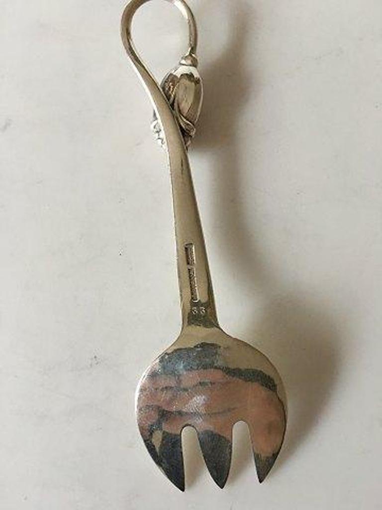 O. Mogensen sterling silver sardine fork. 

Measures: 13 cm L (5 5/16